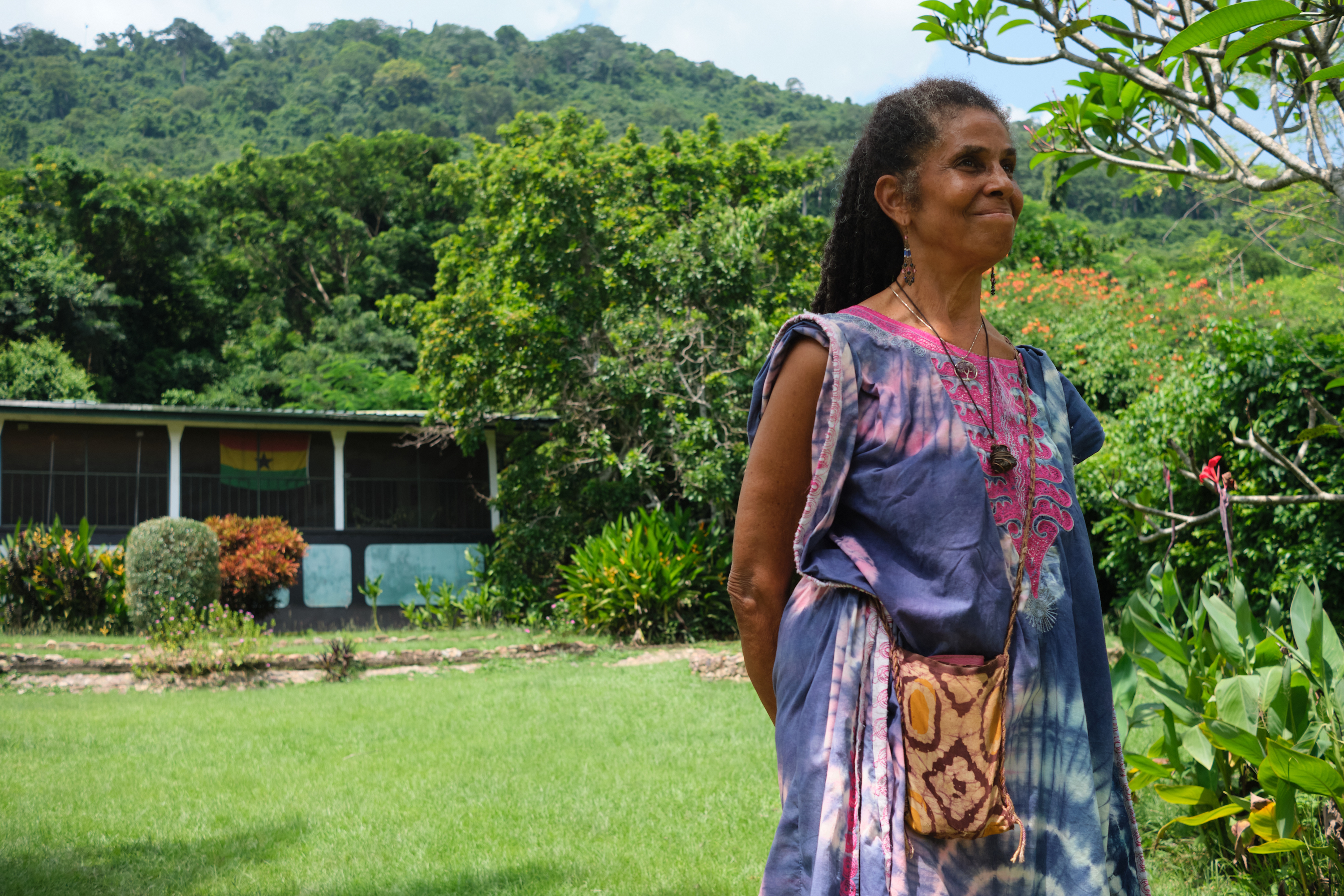 Kaufman stands in front of her home in Akwamufie