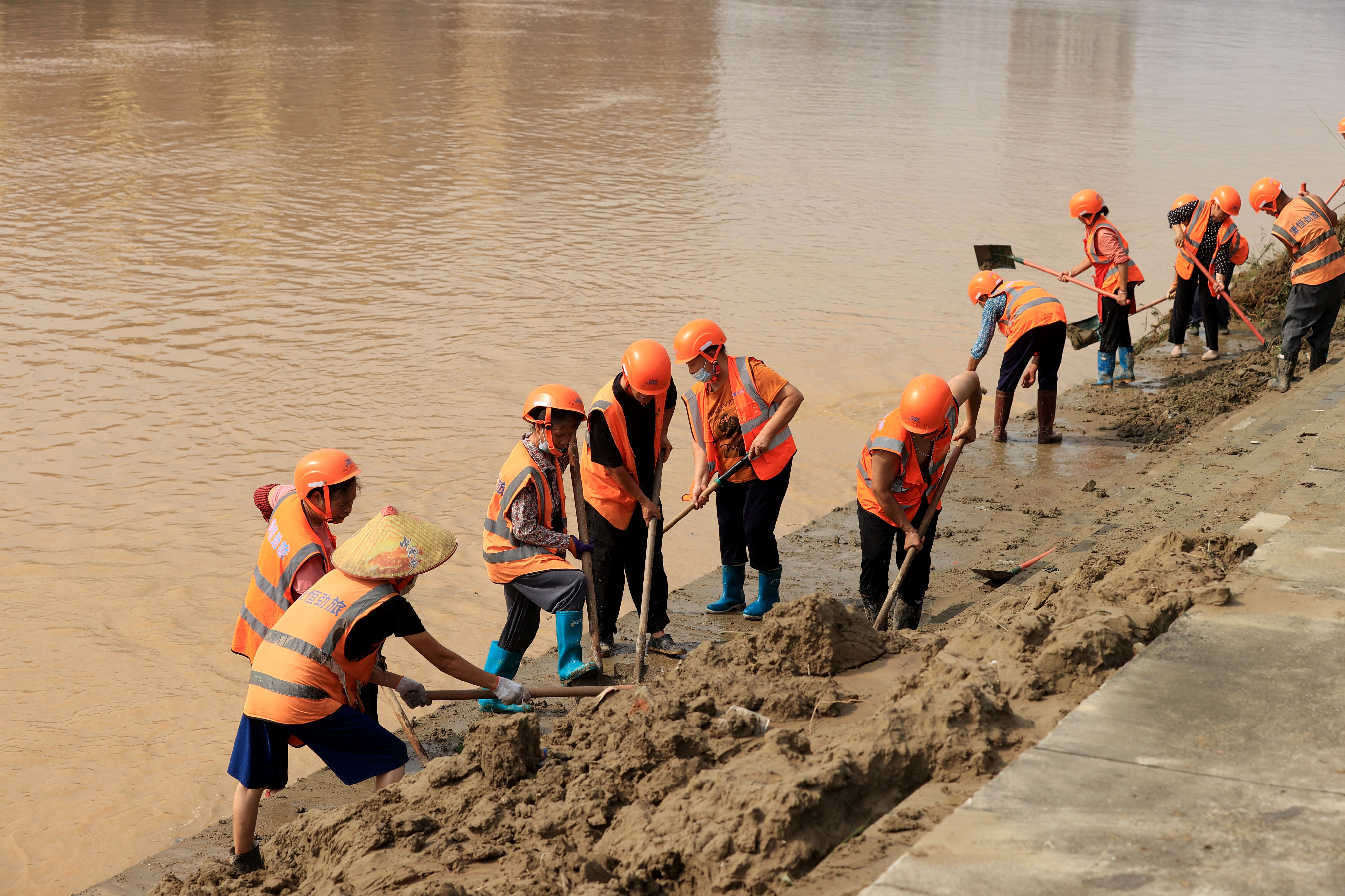 Workers clean-up post-flood China
