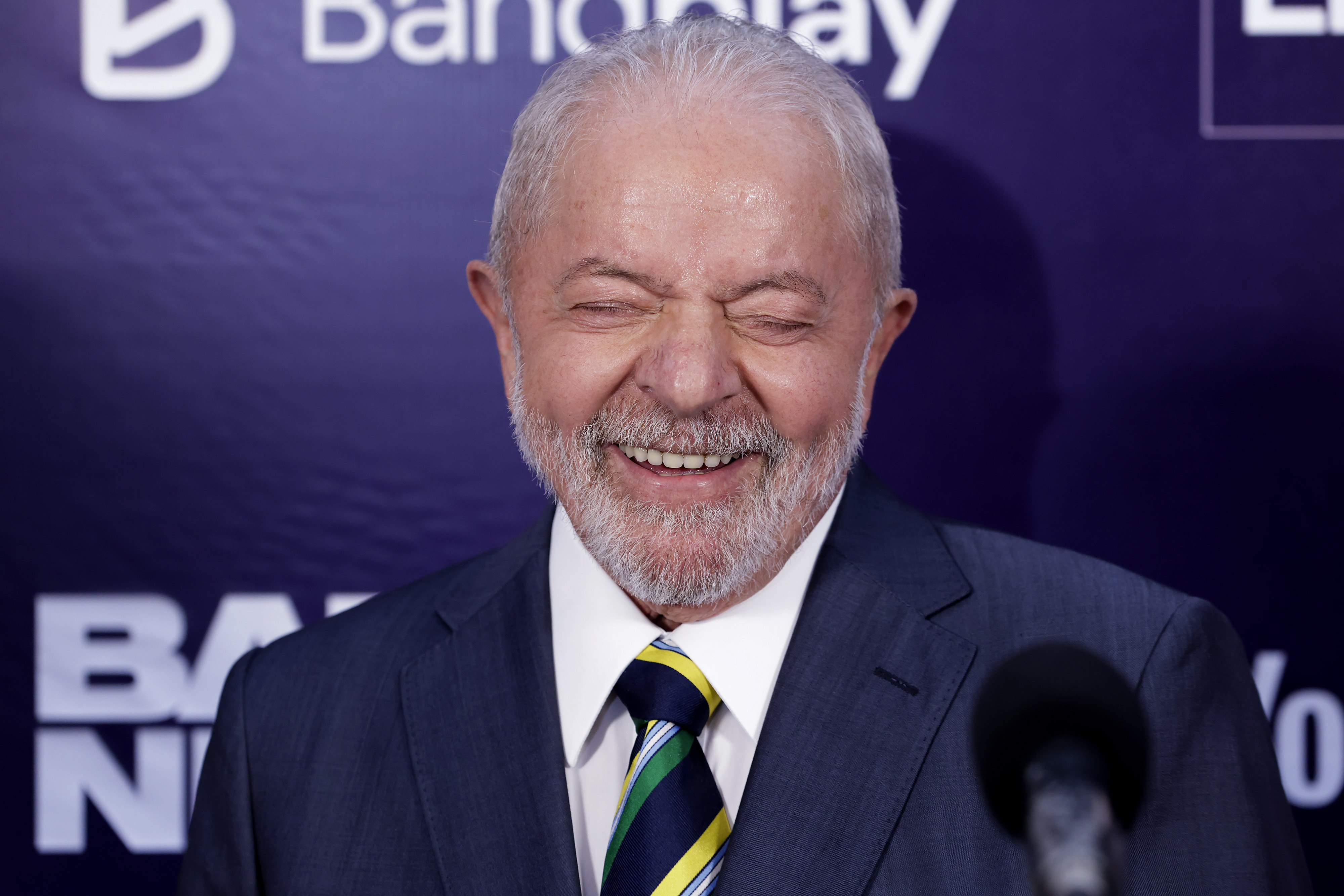SAO PAULO, BRAZIL - OCTOBER 16: Candidate of Worker’s Party (PT) Luiz Inácio Lula Da Silva laughs while speaking to members of the media as he arrives for the presidential debate organized by Bandeirantes TV ahead of the run-off on October 16, 2022 in Sao Paulo, Brazil. (Photo by Alexandre Schneider/Getty Images)