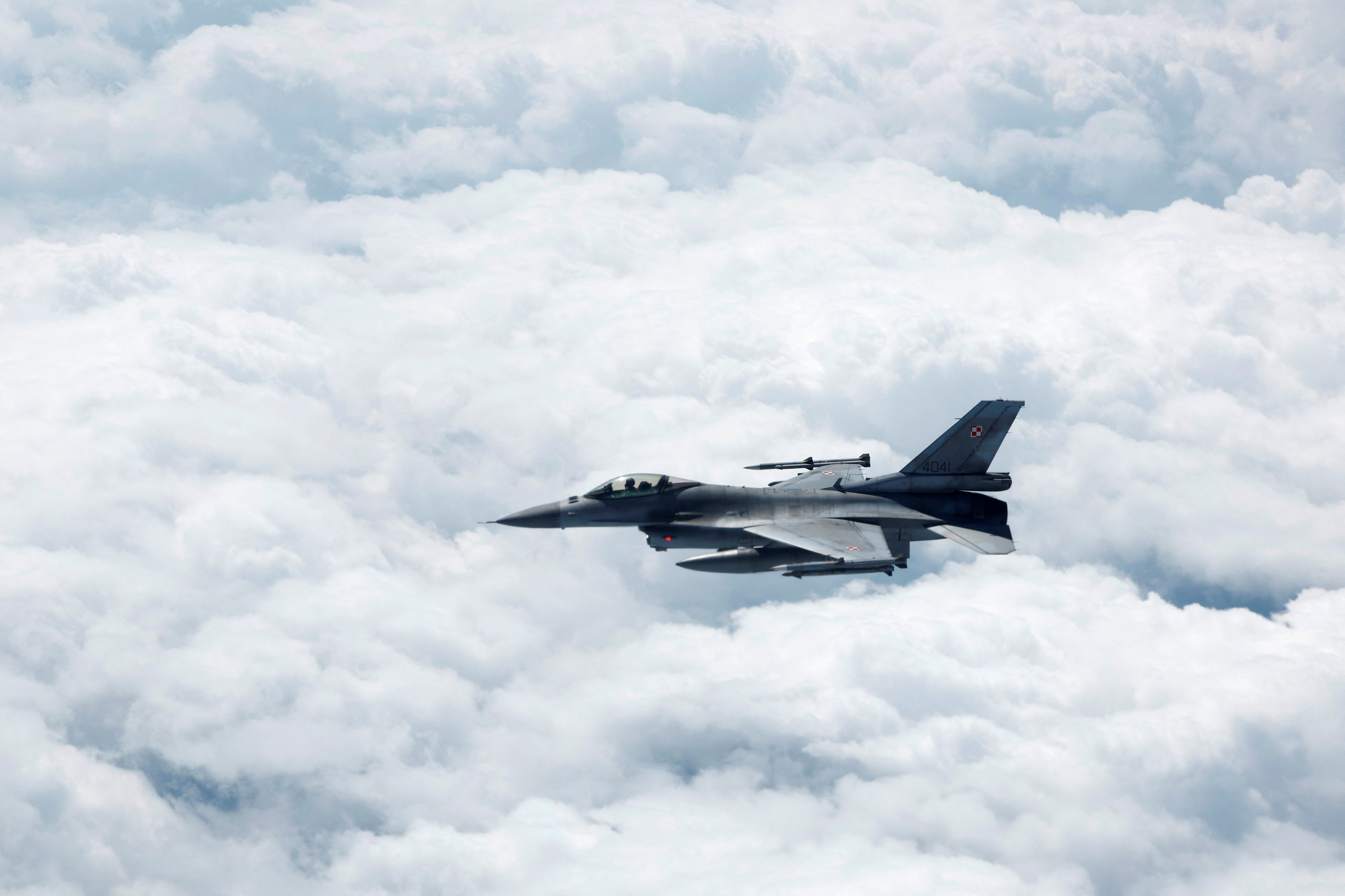 A Polish Air Force F-16 fighter jet flies during a NATO media day on July 4, 2023.