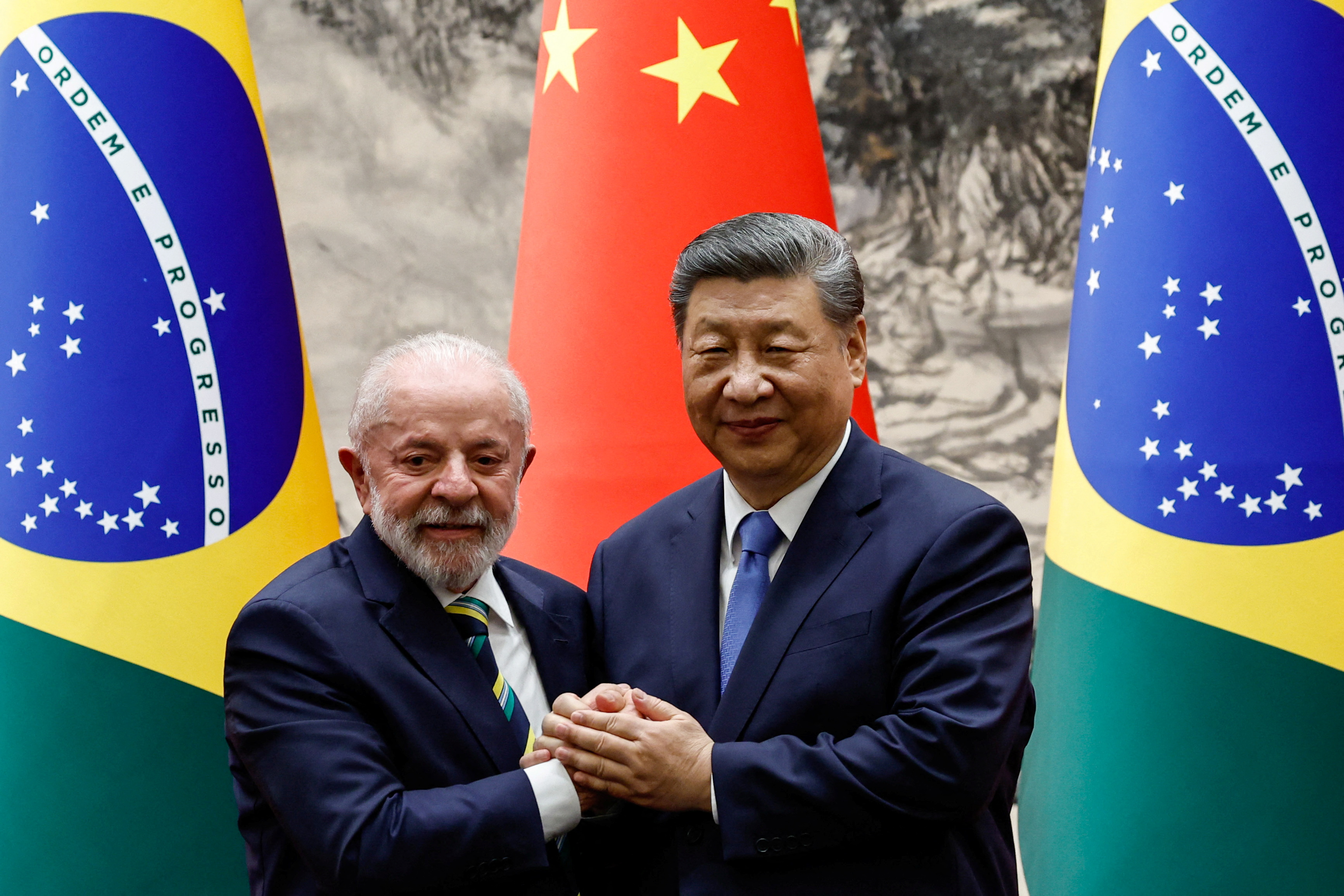 Brazil's President Luiz Inacio Lula da Silva, left, with his Chinese counterpart, Xi Jinping, in Beijing
