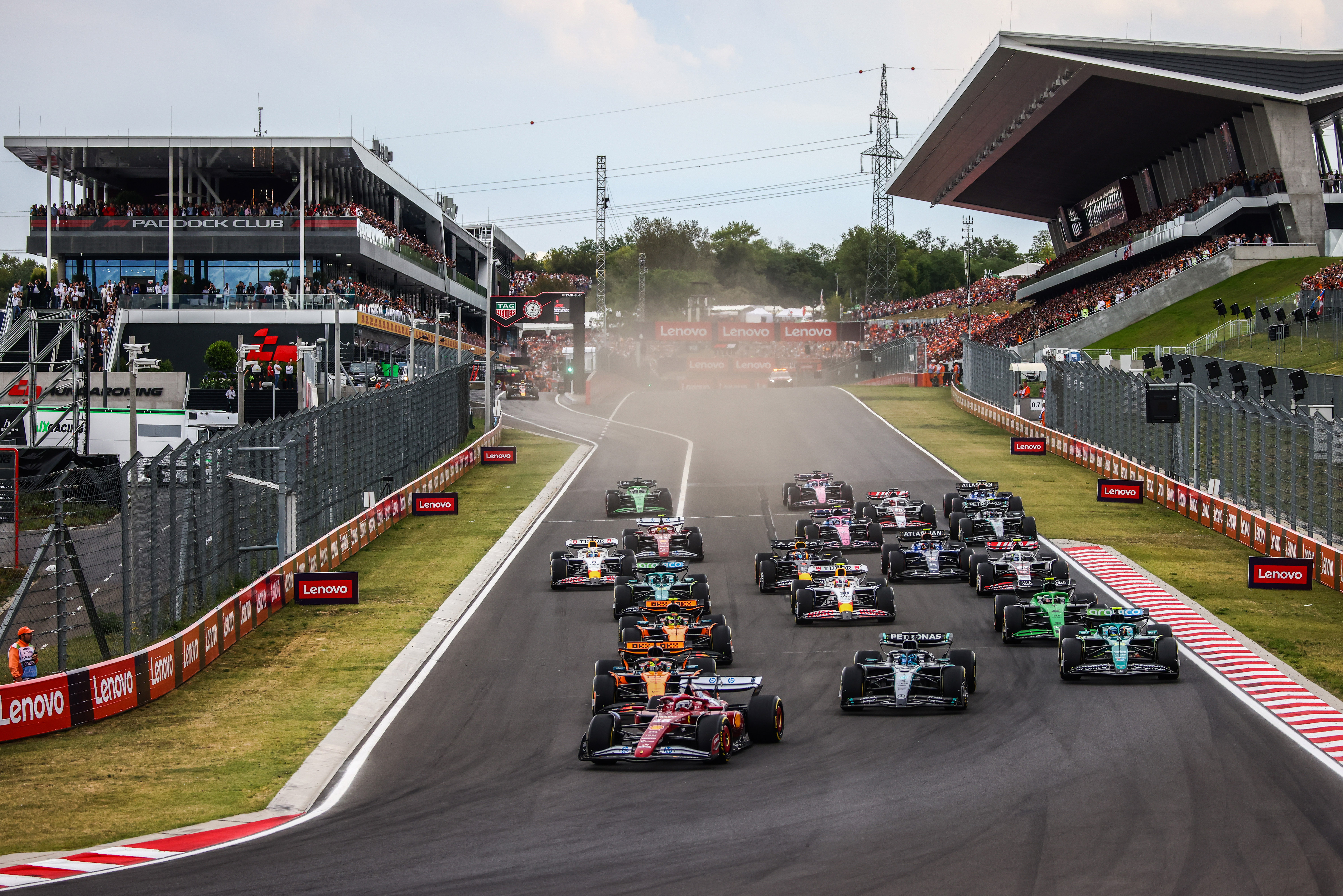 Charles Leclerc of Ferrari leads at the start of the Formula 1 Hungarian Grand Prix