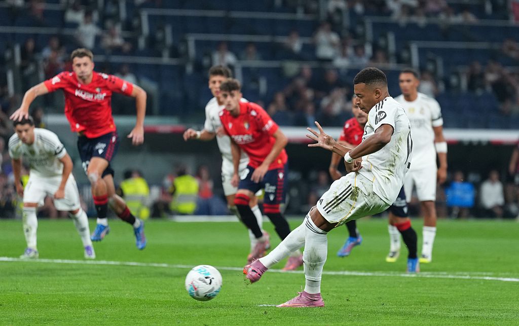 Kylian Mbappé of Real Madrid scores his team's first goal