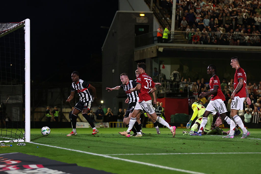 Tyrell Warren of Grimsby Town scores his team's second goal during the Carabao Cup Second Round match between Grimsby Town and Manchester United