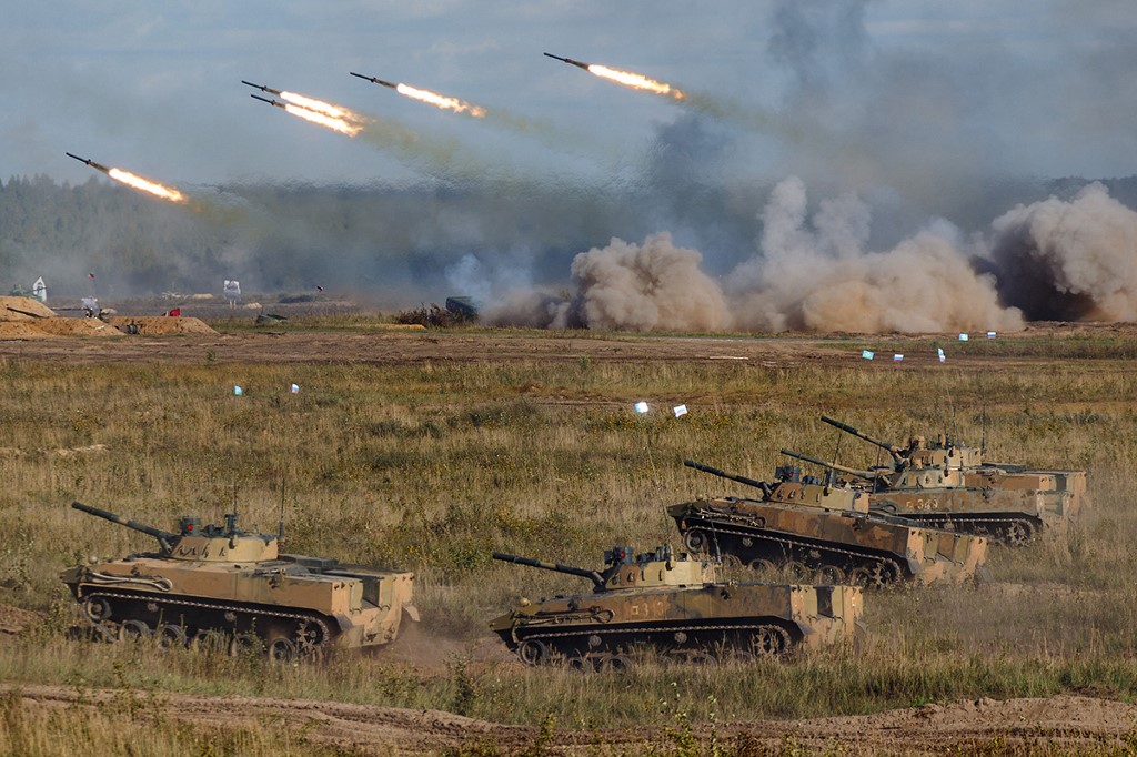 Tanks moving and rockets flying as part of military drills.