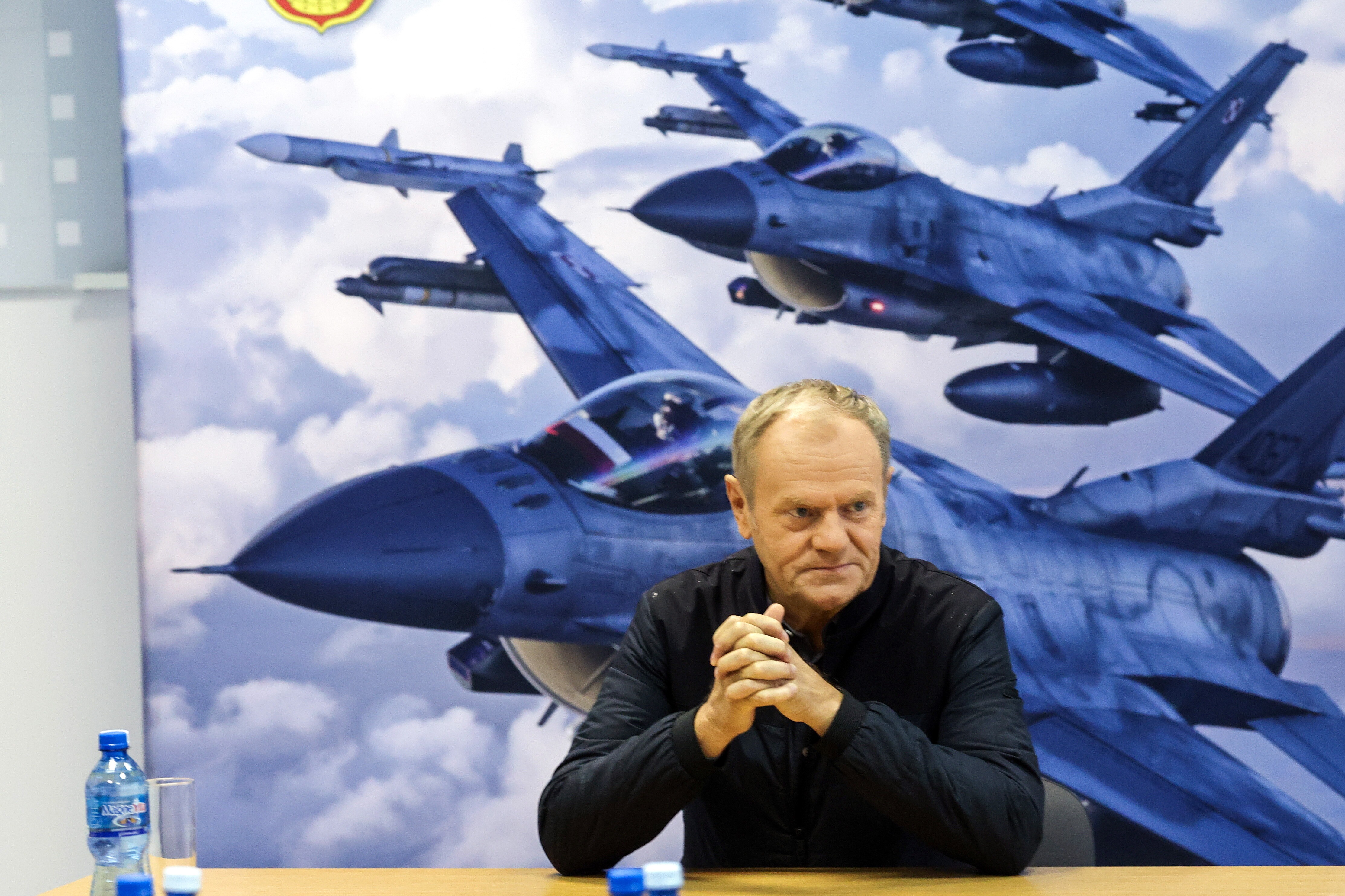 Polish Prime Minister Donald Tusk attends a meeting with air force personnel during a visit to the 32nd Tactical Air Base in Lask, Poland on September 11, 2025.