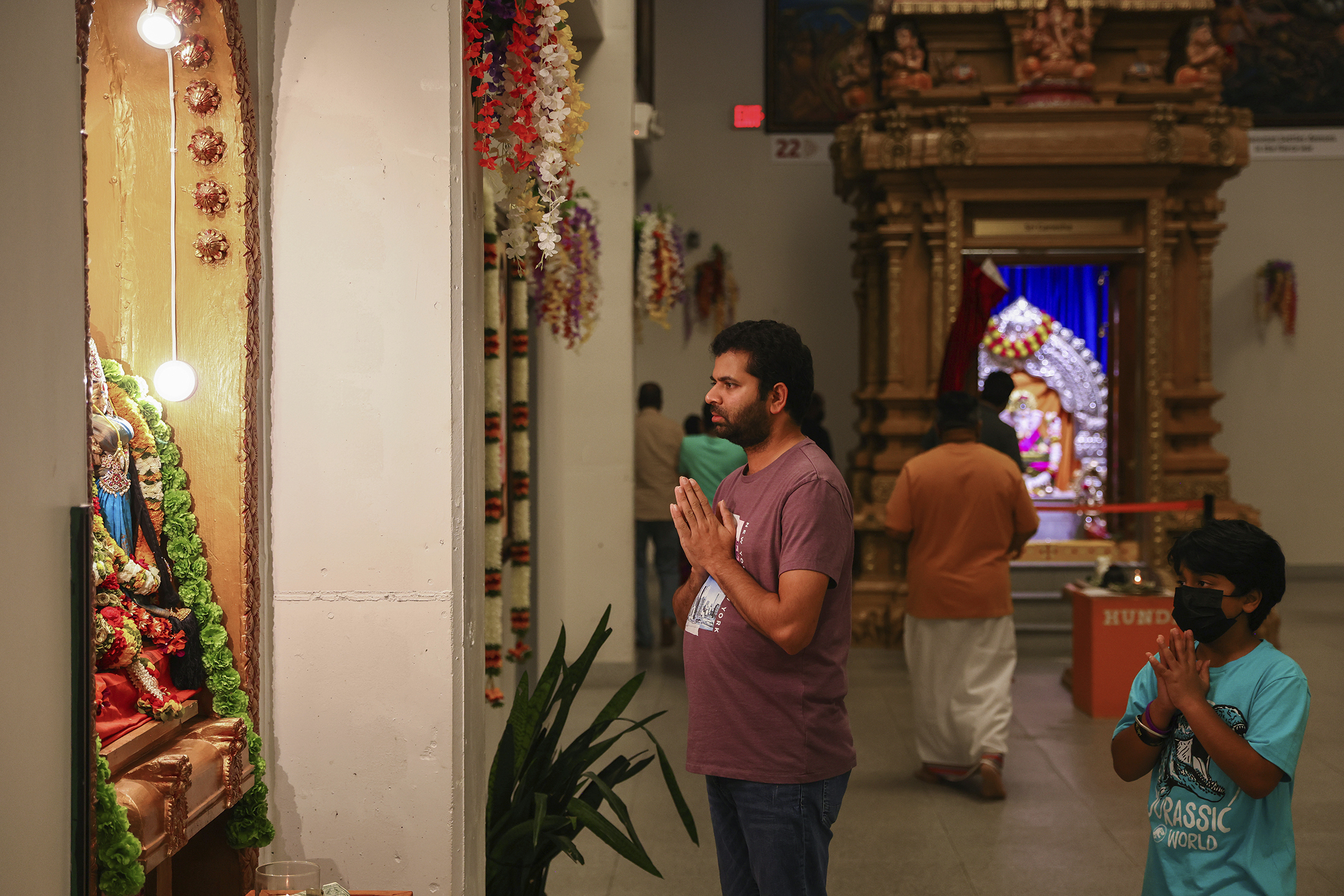 FILE - Worshippers pray at the Karya Siddhi Hanuman Temple in Frisco, Texas, Oct. 22, 2022, as worshippers celebrated Dhanteras, which is the first night of the Hindu holiday Diwali. (AP Photo/Andy Jacobsohn, File)