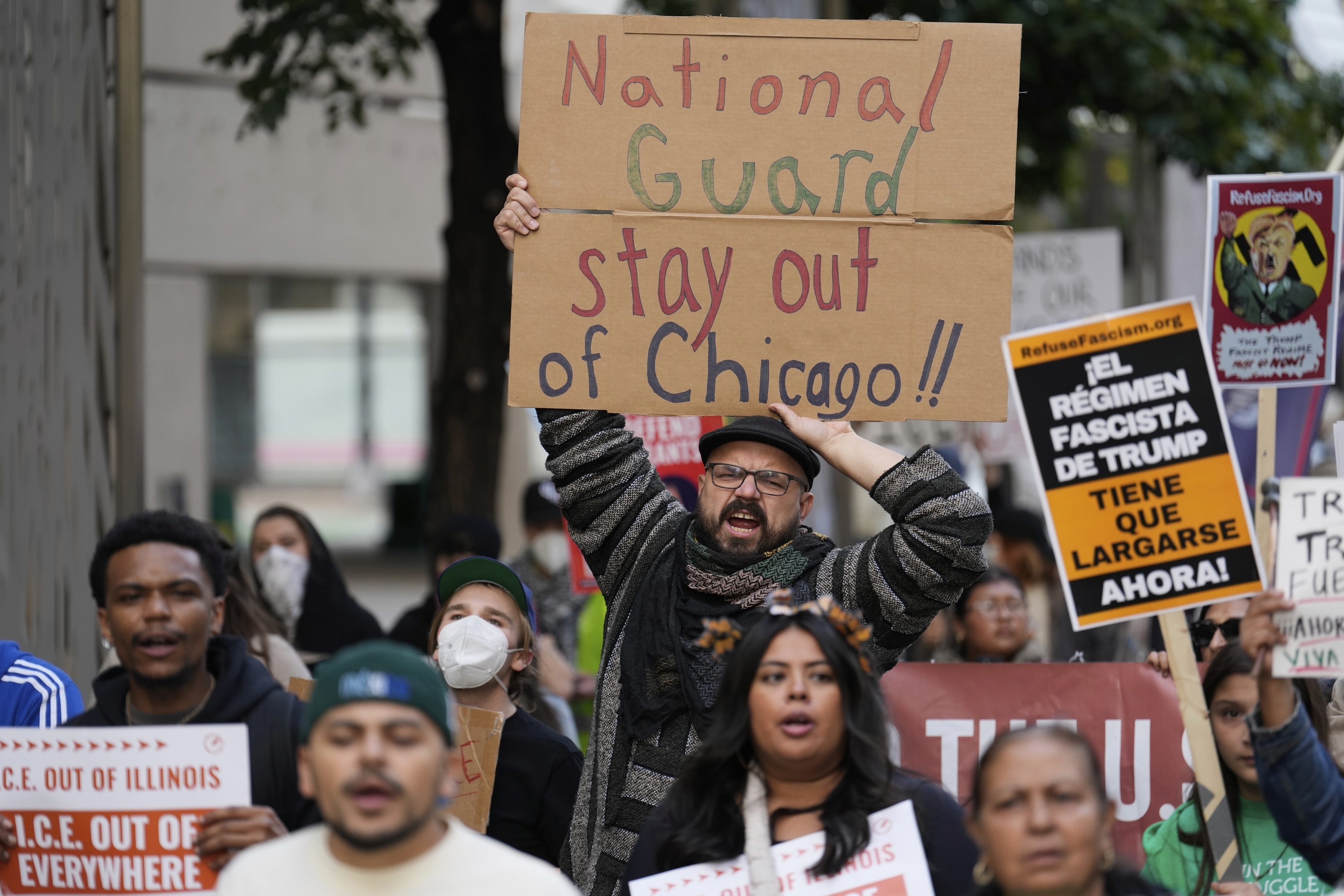 People march during Illinois Coalition for Immigrant & Refugee Rights' "Chicago Says No Trump No Troops" protest Saturday, Sept. 6, 2025, in Chicago.