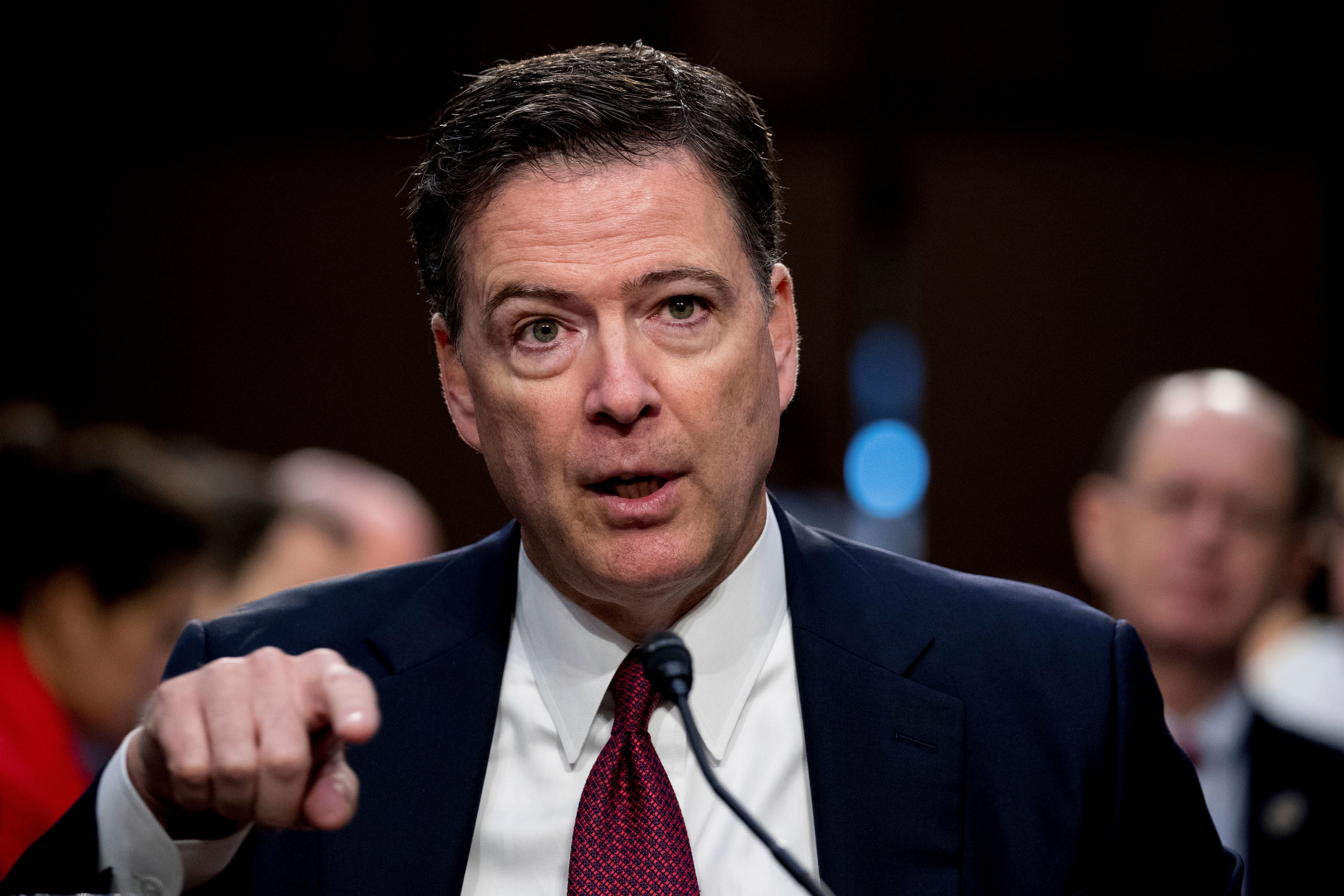 Former FBI director James Comey speaks.