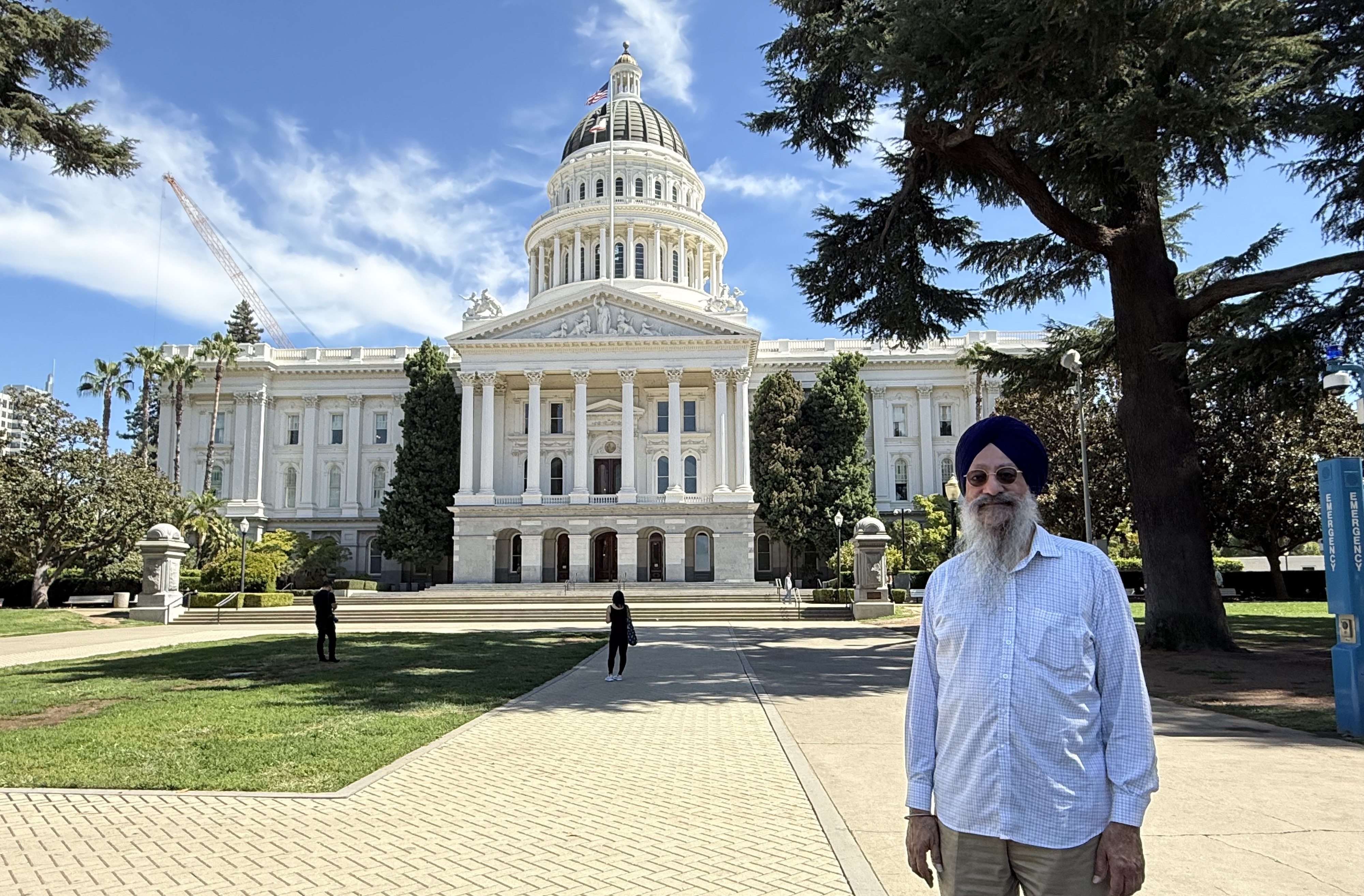 Gurtej Singh Cheema in front of the State Capitol Complex in Sacramento - by Gagandeep Singh.