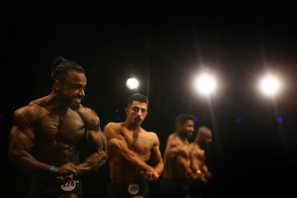 Competitors take part in the Men's Classic Physique competition during Dubai Muscle Beach at Mall of the Emirates