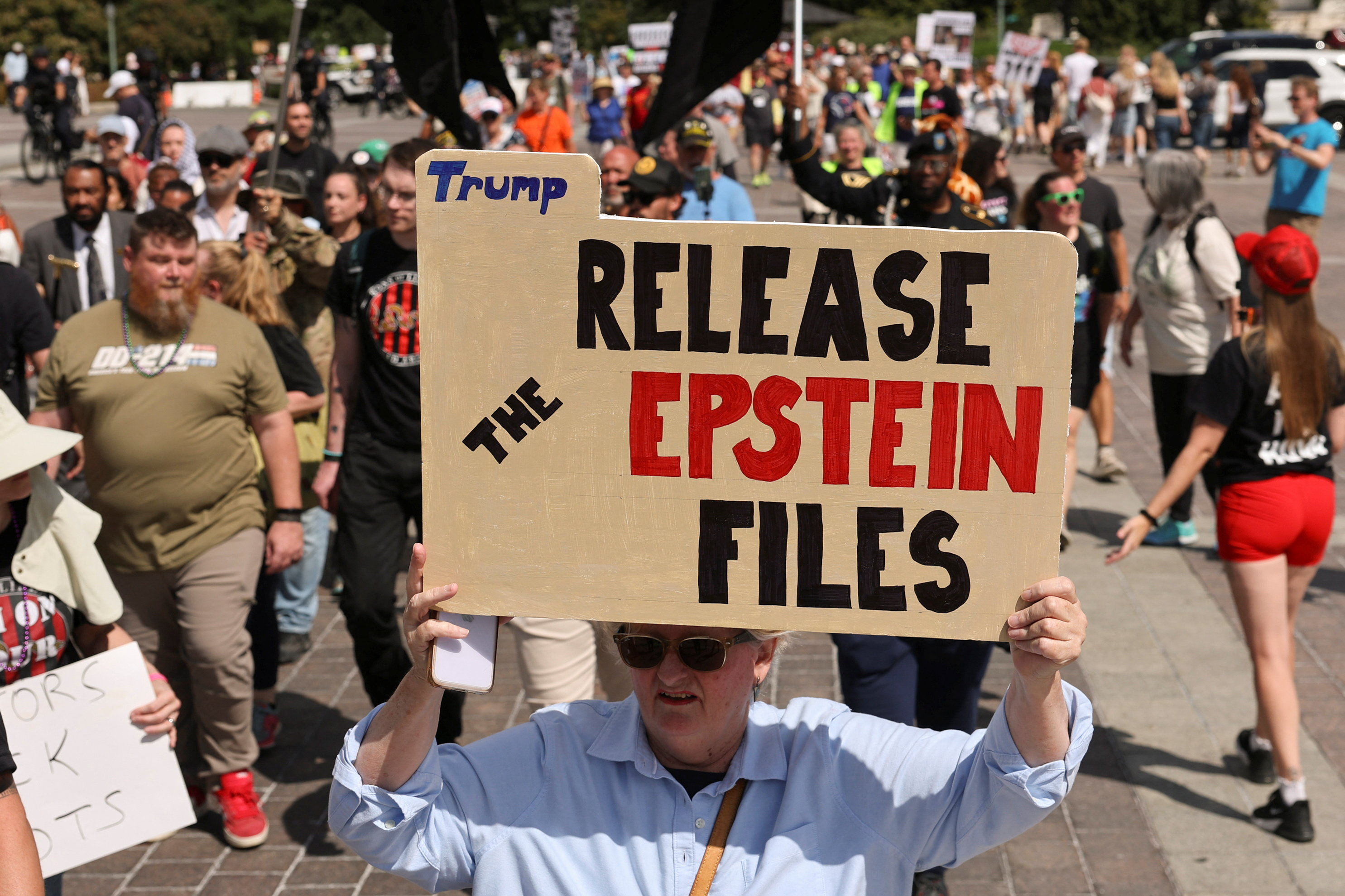 Anti-Trump demonstrators march near the U.S. Capitol, protesting against issues including the Jeffrey Epstein case and the increased presence of military and federal law enforcement in the D.C area ordered by U.S President Donald Trump, in Washington, D.C., U.S. September 2, 2025. REUTERS/Jonathan Ernst