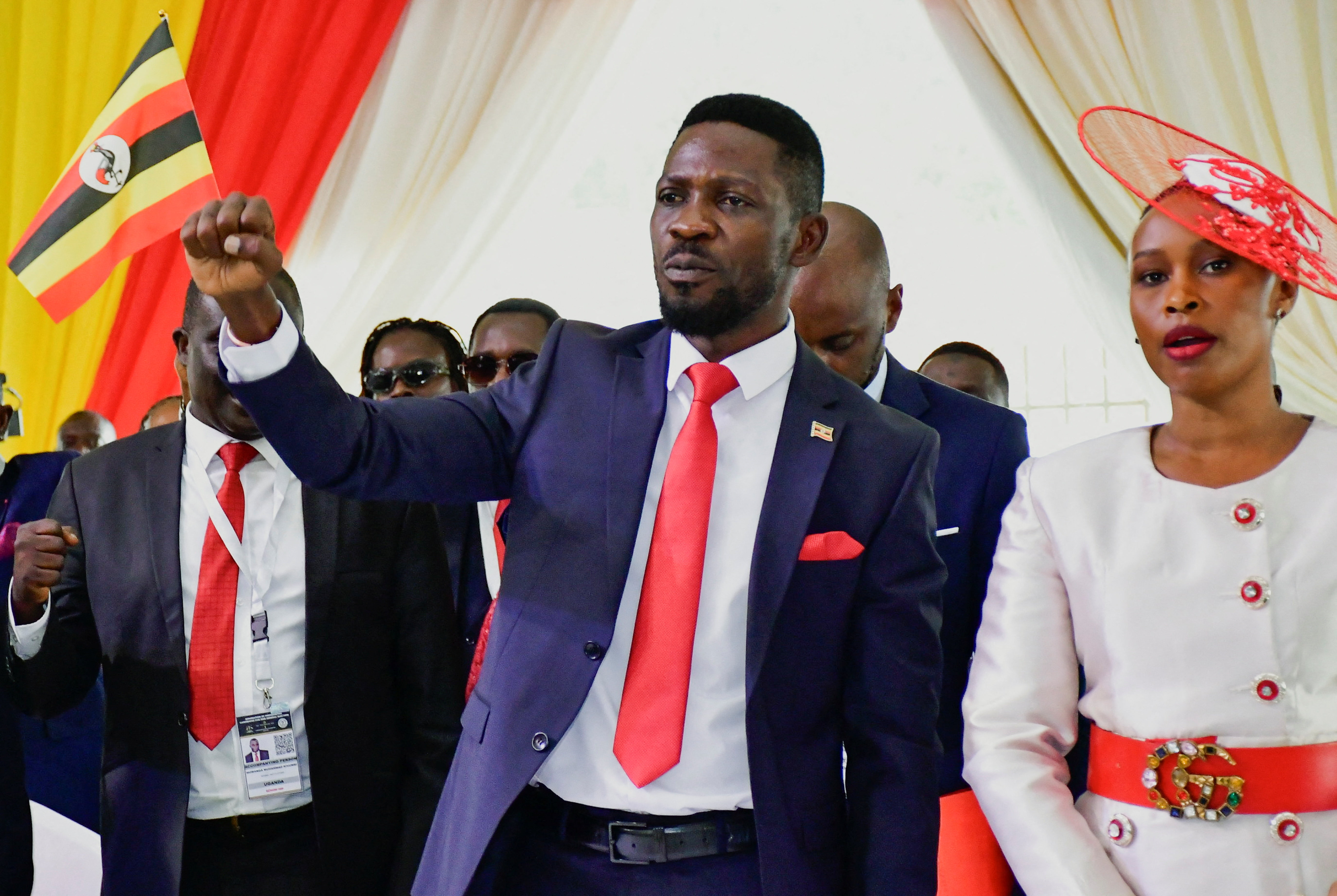 Robert Kyagulanyi, also known as Bobi Wine, of the National Unity Platform (NUP) party, and his wife Barbara Itungo Kyagulanyi, attend a ceremony for his nomination as a presidential candidate at the Electoral Commission offices in Kampala, Uganda September 24, 2025. REUTERS/Abubaker Lubowa