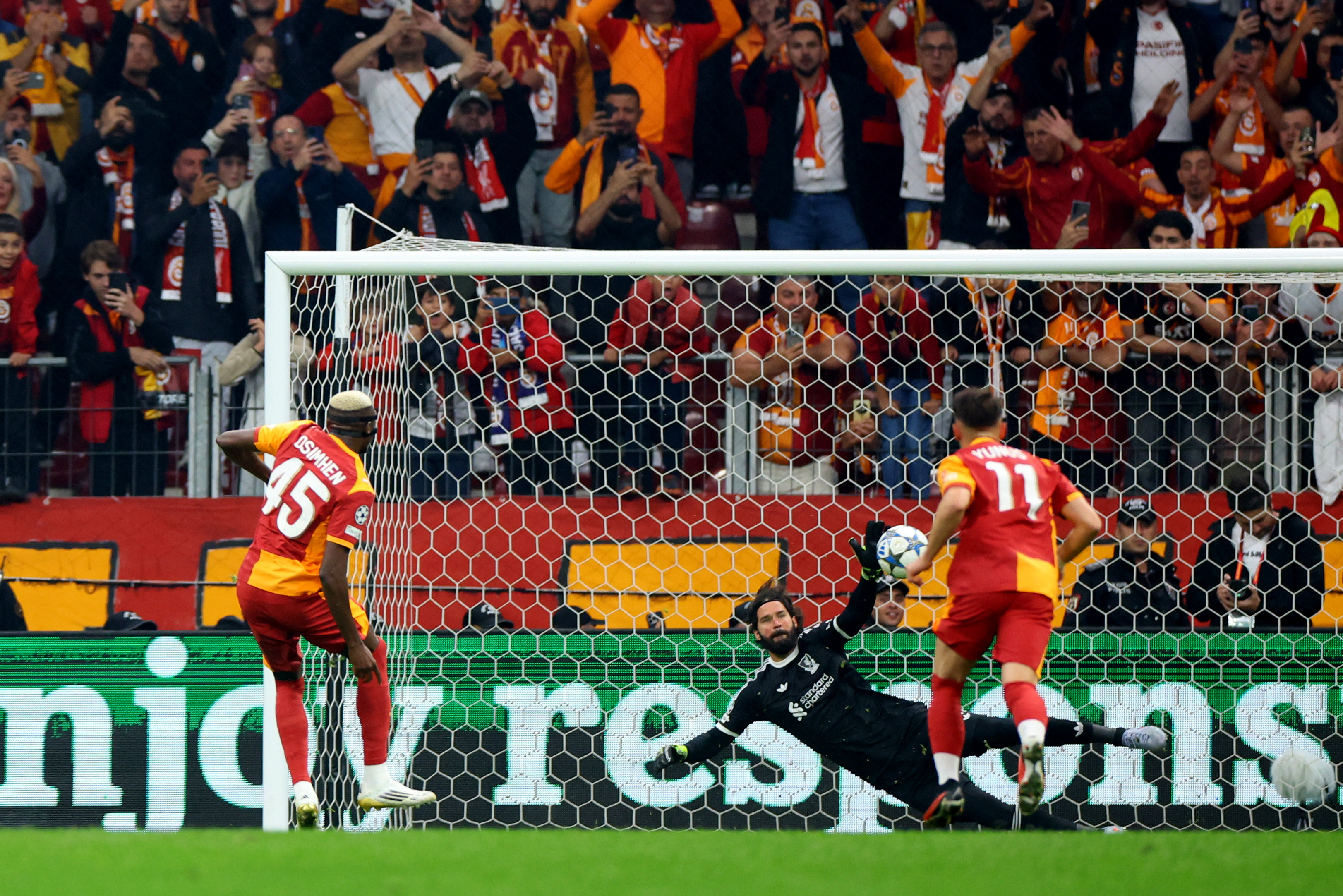 Soccer Football - UEFA Champions League - Galatasaray v Liverpool - Rams Park, Istanbul, Turkey - September 30, 2025 Galatasaray's Victor Osimhen scores their first goal from the penalty spot REUTERS/Murad Sezer