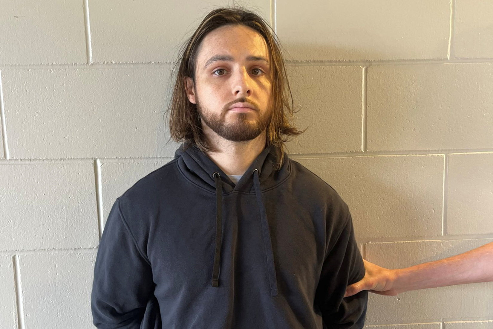 Jonathan Rinderknecht, 29, is posed after his arrest on charges that he intentionally ignited the Pacific Palisades Fire in Los Angeles, before his first court appearance in Orlando, Florida, US, October 8, 2025