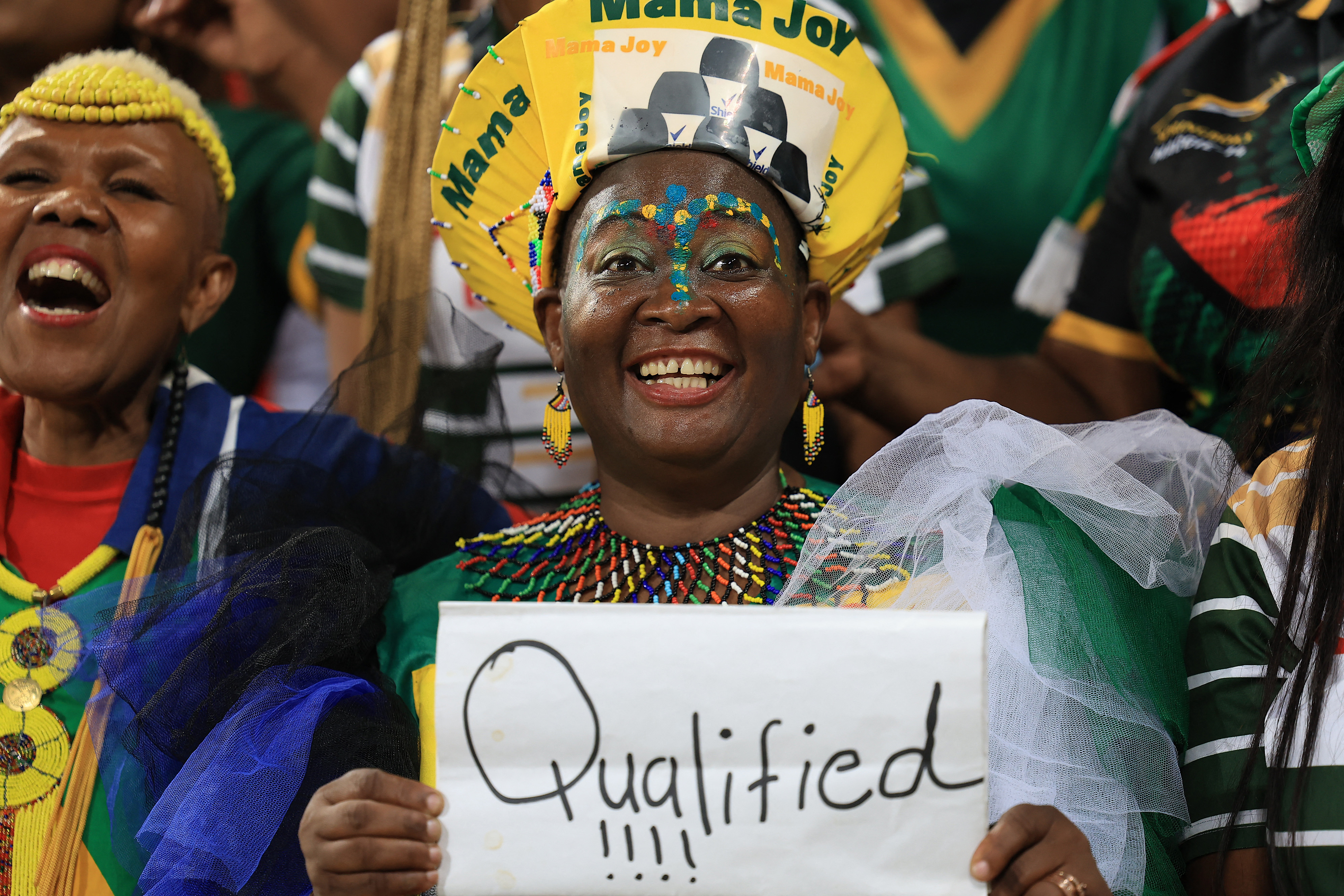 South Africa fans celebrate after qualifying for the FIFA World Cup [Esa Alexander/Reuters]
