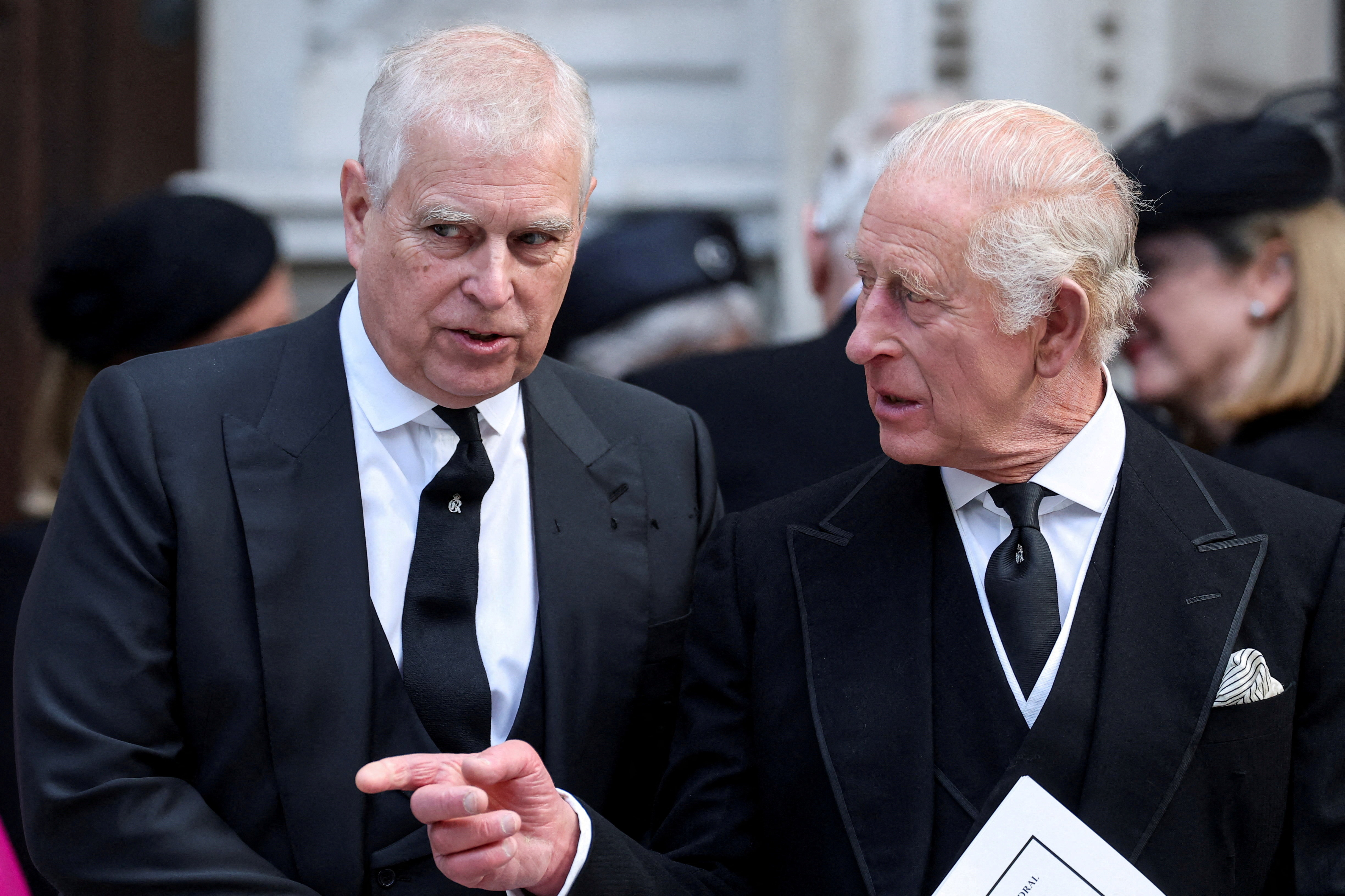 FILE PHOTO: UK’s Prince Andrew speaks with King Charles as they leave Westminster Cathedral at the end of the Requiem Mass, on the day of the funeral of Britain’s Katharine, Duchess of Kent, in London, UK, September 16, 2025