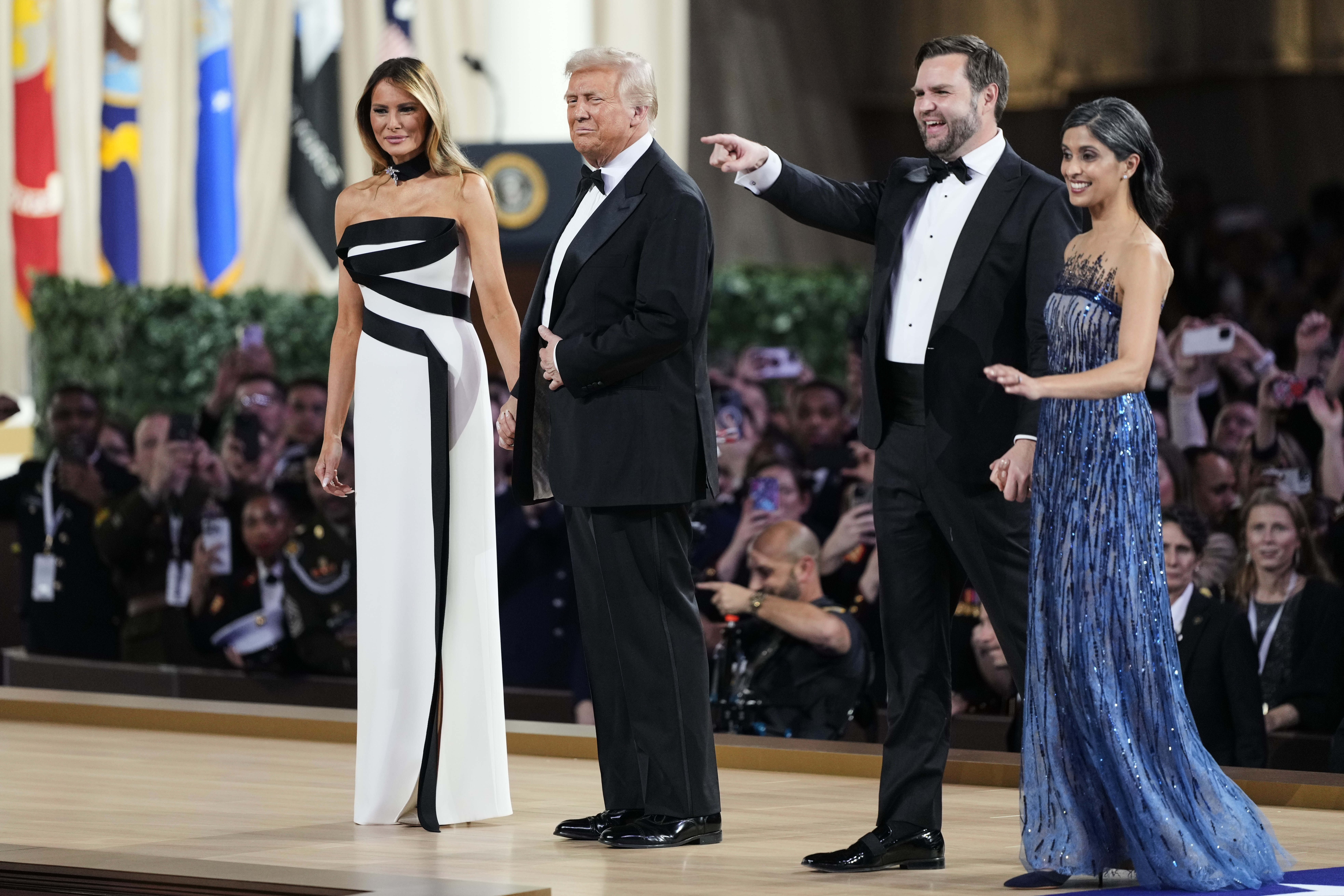 Donald Trump, Melania Trump, Usha Vance and JD Vance in suits and ball gowns.