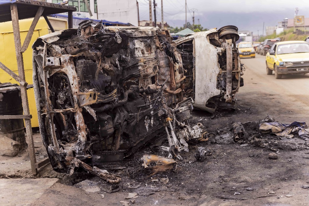 Burnt-out vehicles are scattered throughout the South West region, a testament to the area’s unrest