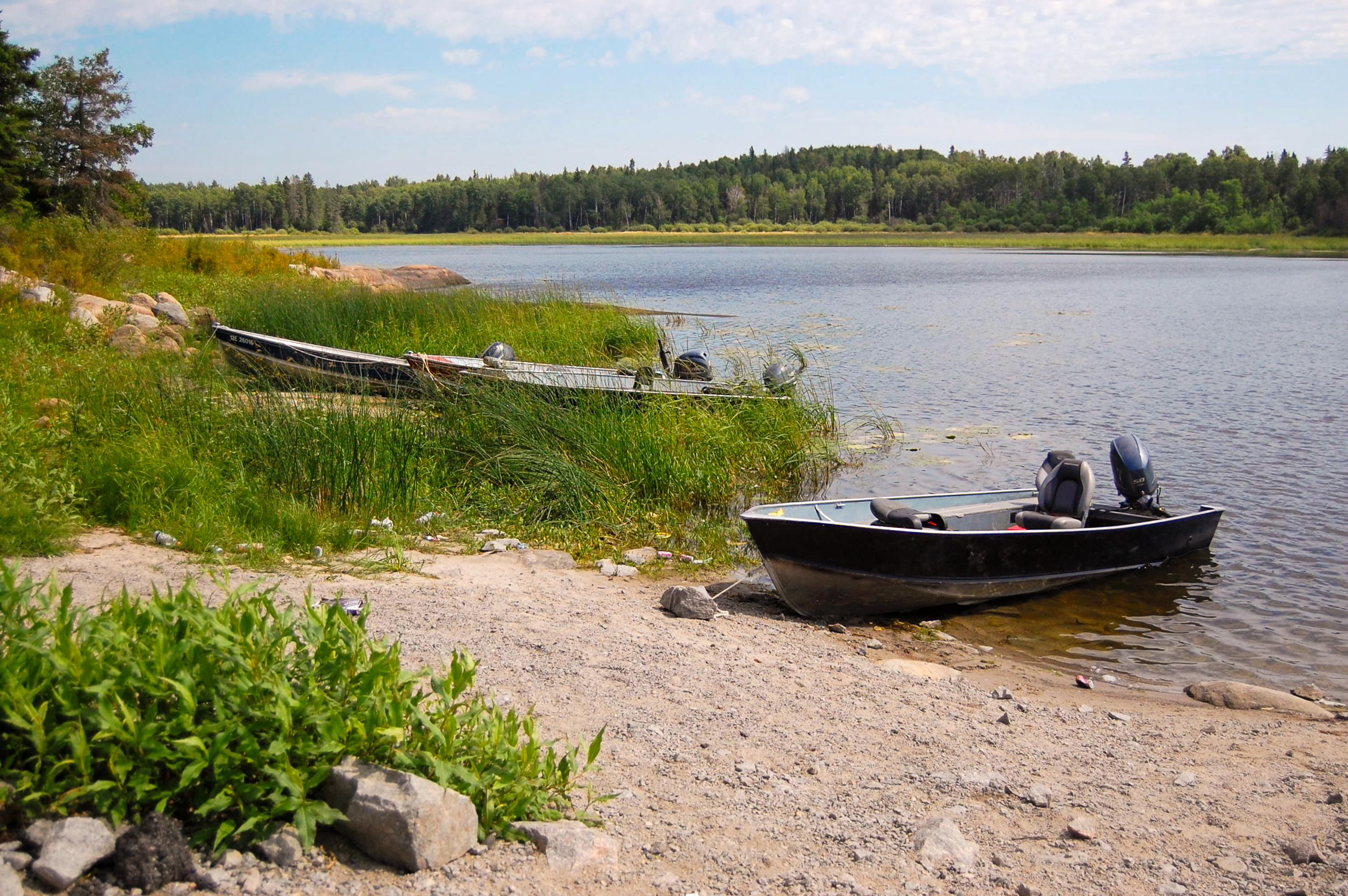 Boats on the water in Grassy Narrows First Nation