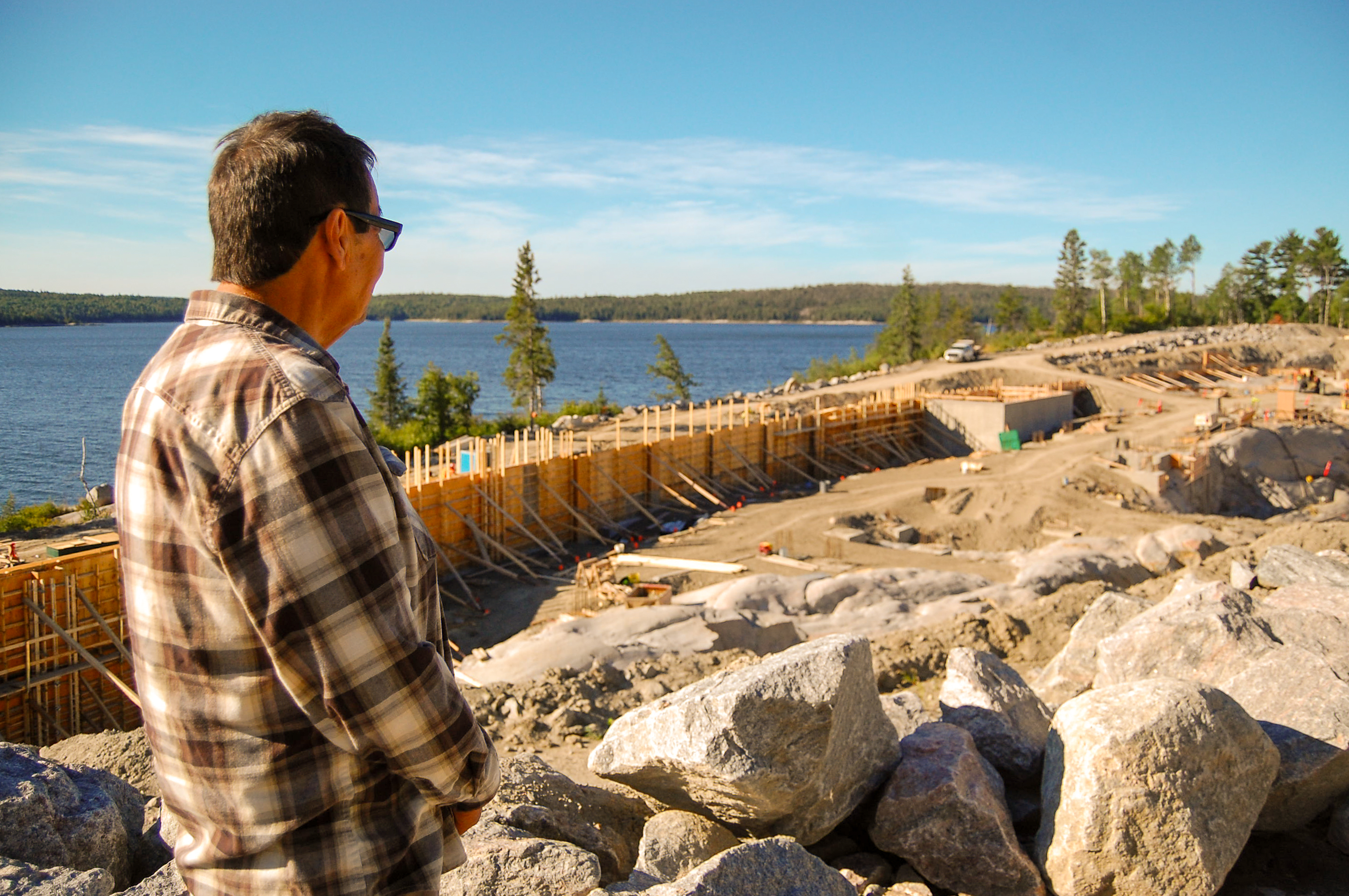 Robert Williamson looks out over construction of Grassy Narrows's mercury care facility