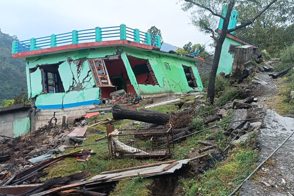 A collapsed house in a village.