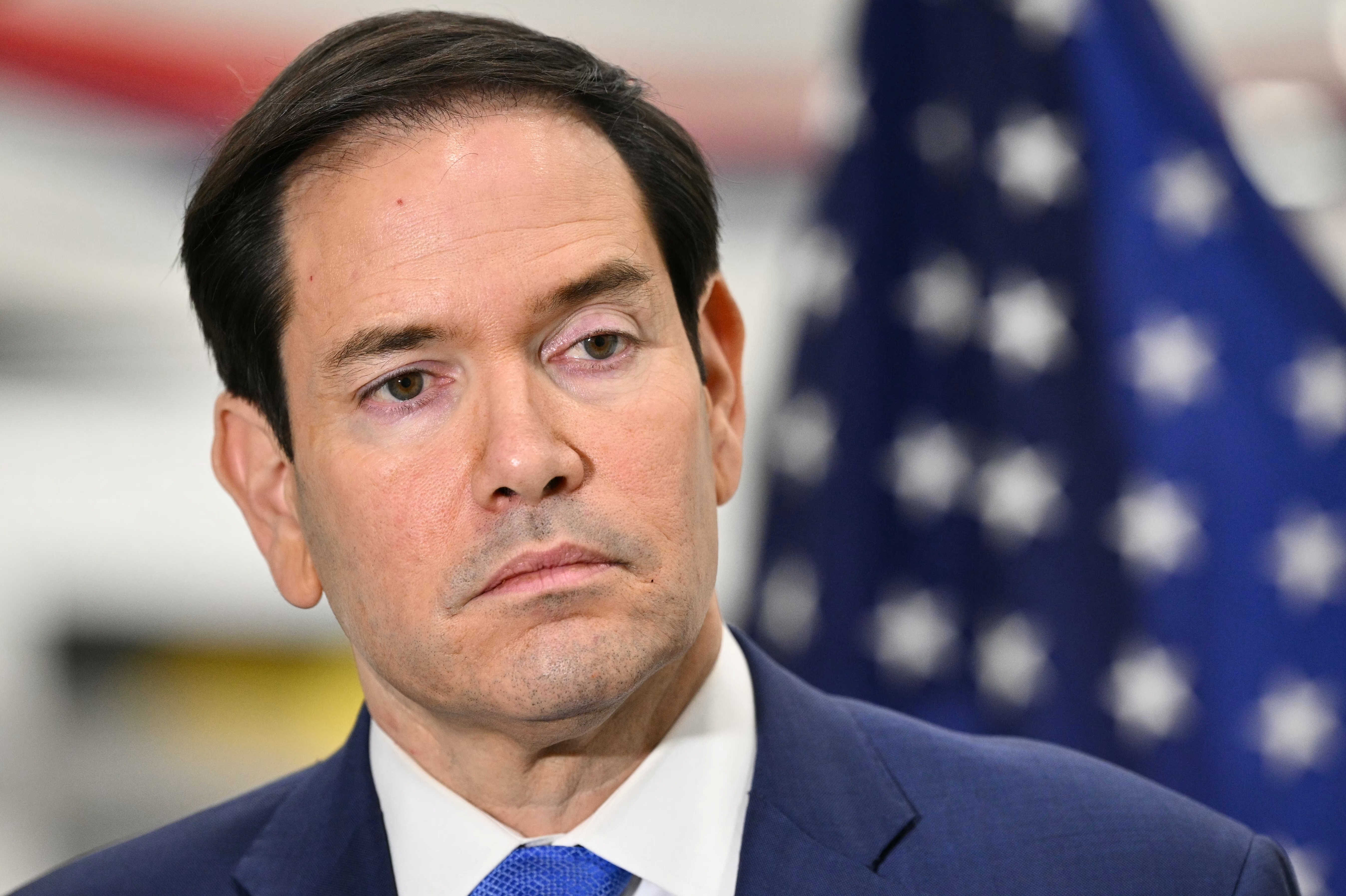 US Secretary of State Marco Rubio speaks to traveling journalists at the John C. Munro Hamilton International Airport in Hamilton, Ontario, Canada [File: Mandel Ngan/AP]