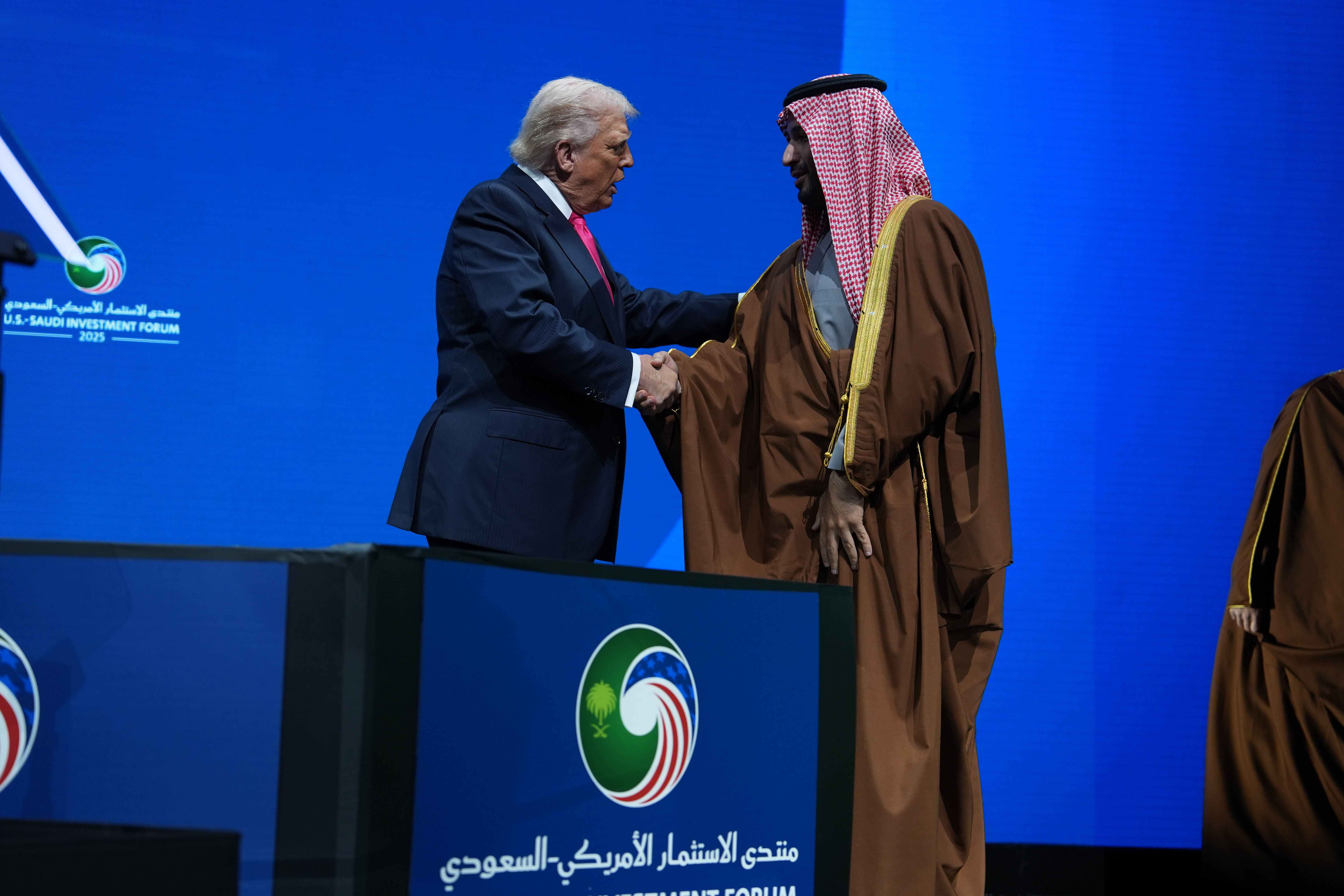 President Donald Trump shakes hands with Saudi Crown Prince Mohammed bin Salman during the Saudi Investment Forum on November 19