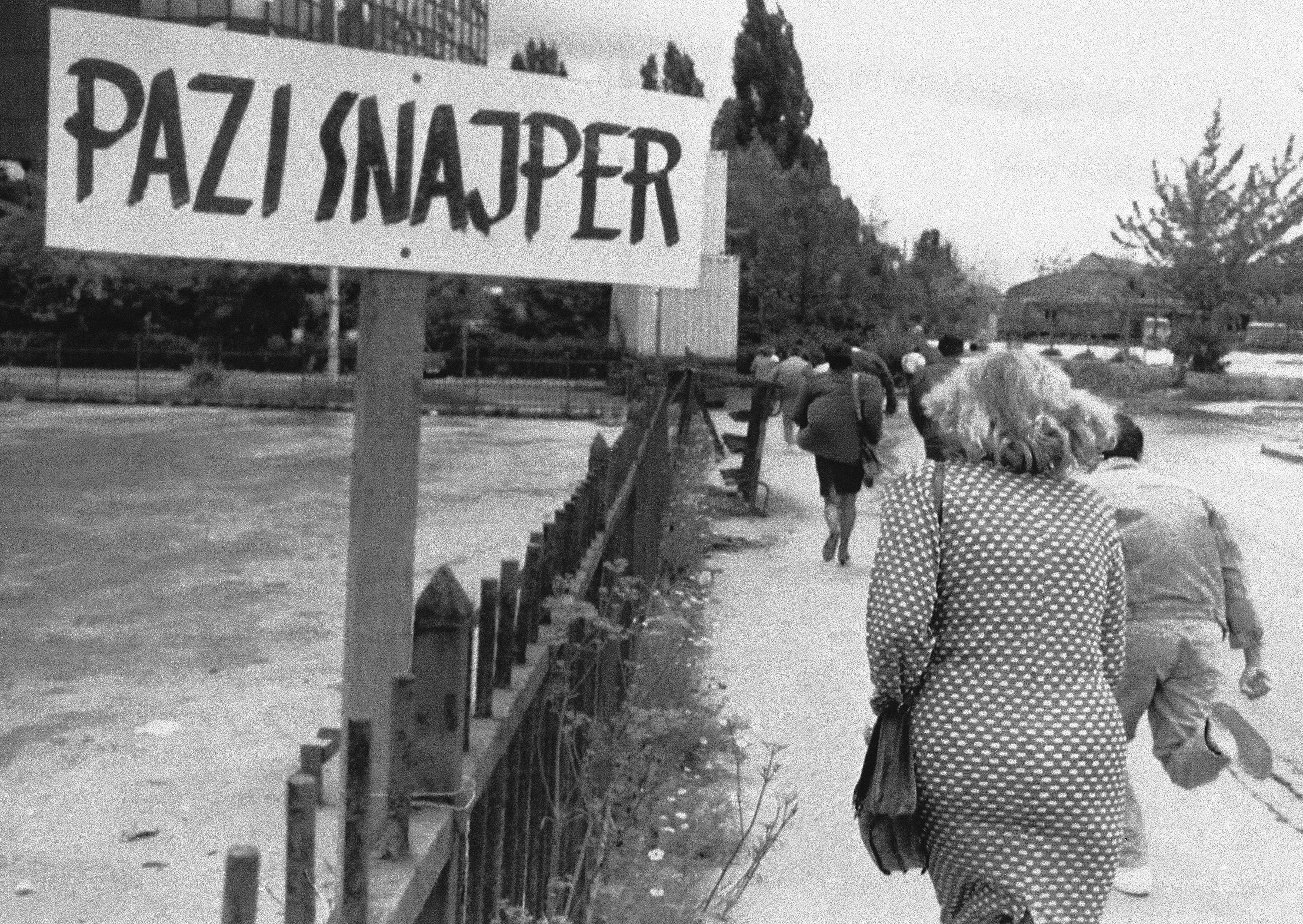 New signs are appearing over the besieged city of Sarajevo to alert the people of the whereabouts of sniper fire in Sarajevo,