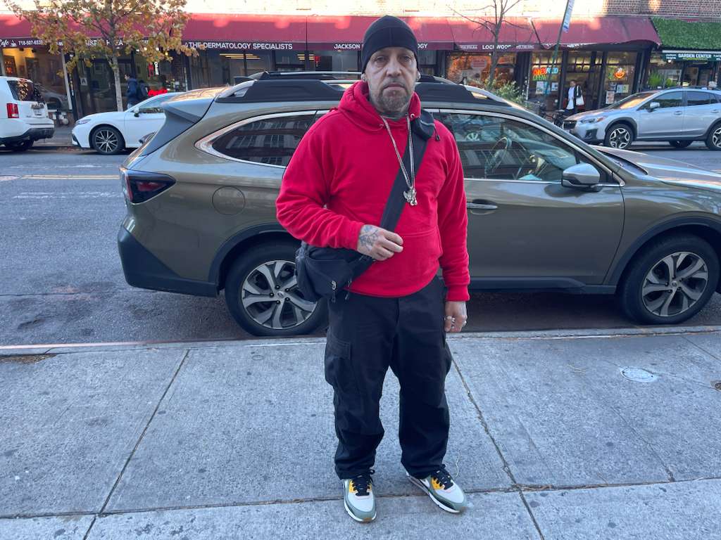 Artemio Figuero, 59, stands outside of a polling station in Jackson Heights, Queens