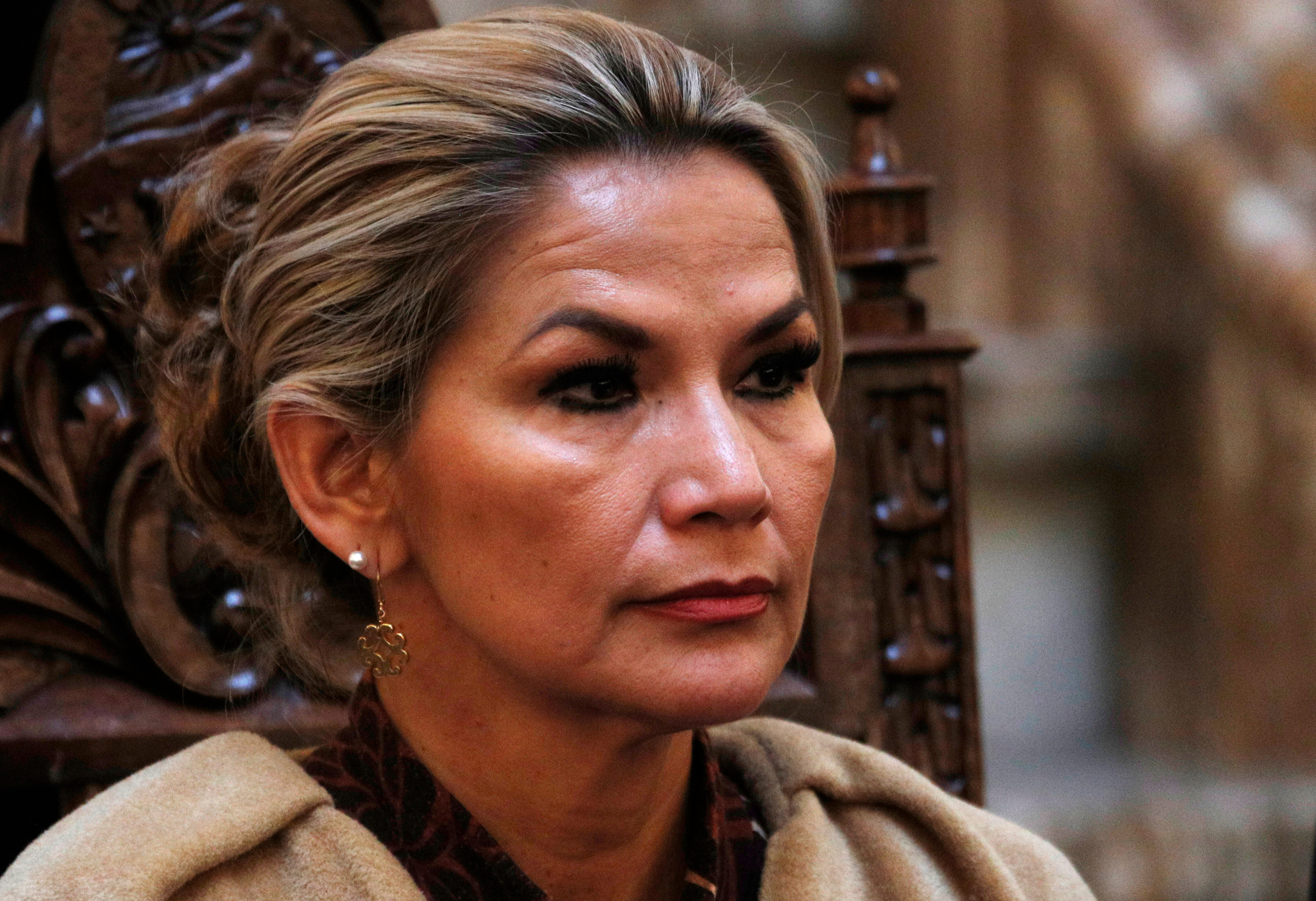 FILE - Bolivia's interim President Jeanine Anez presides over a ceremony at the presidential palace, in La Paz, Bolivia, Nov. 25, 2019. (AP Photo/Juan Karita, File)