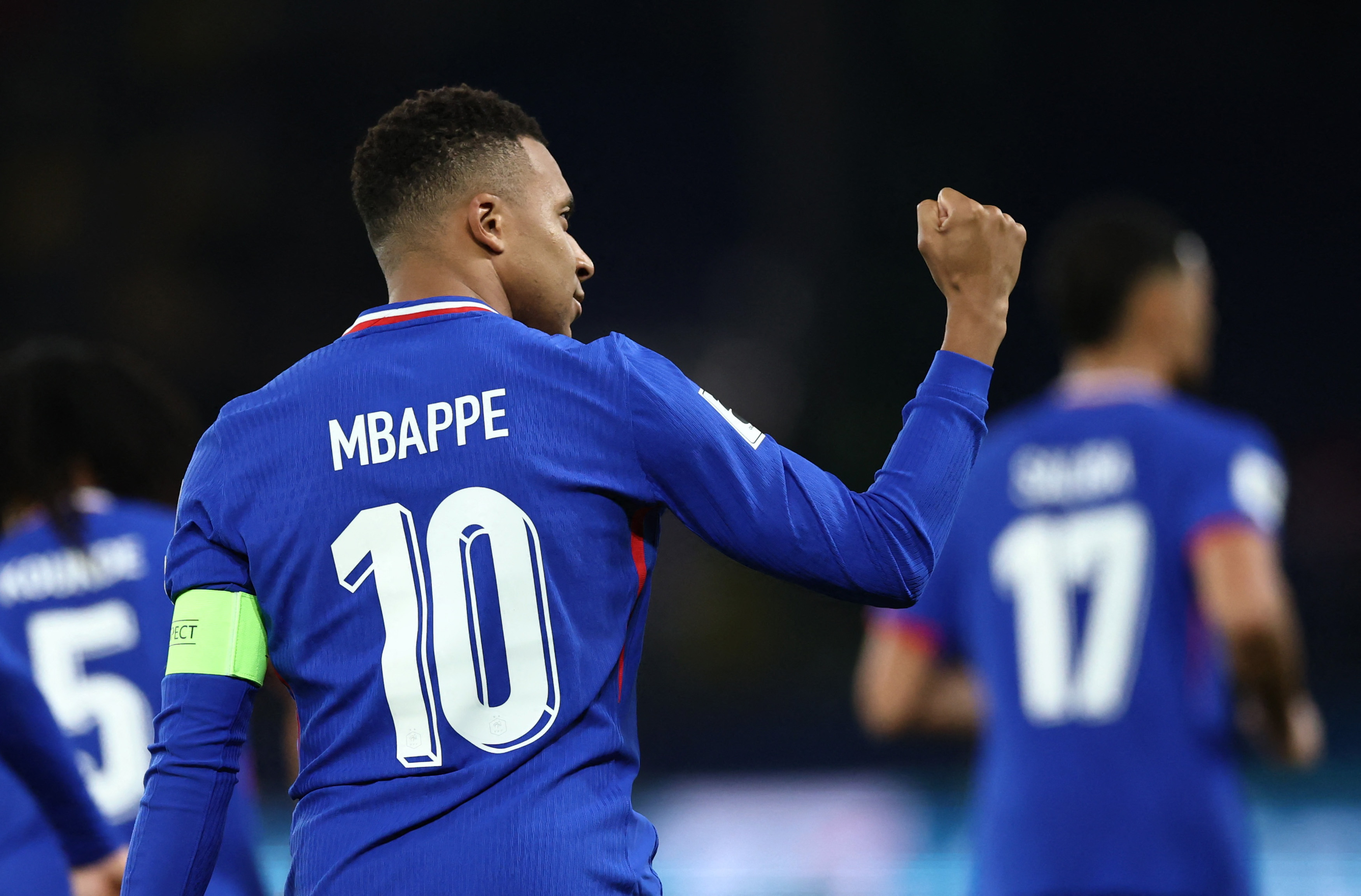 France's Kylian Mbappe celebrates scoring their first goal.
