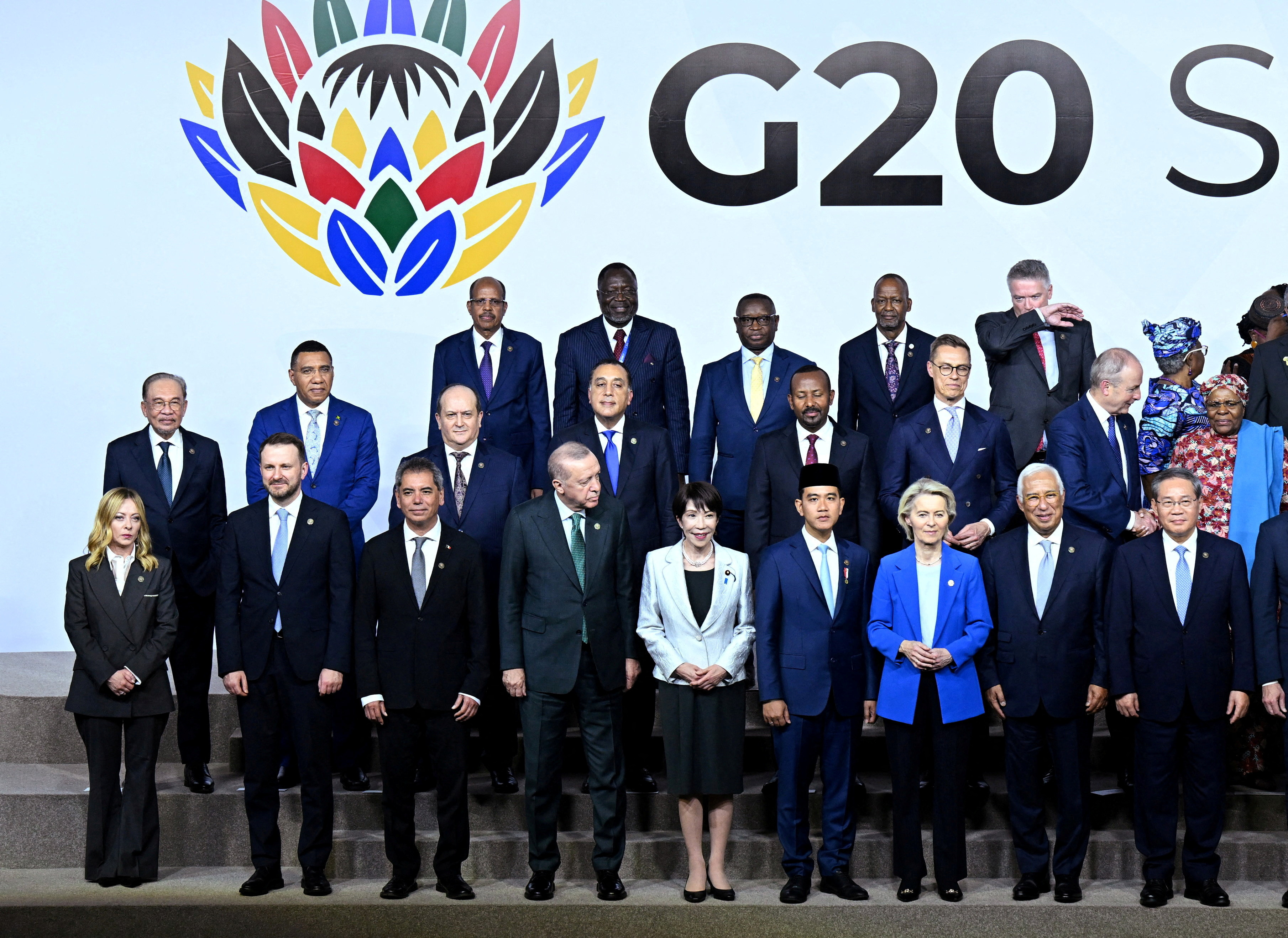 FILE PHOTO: World leaders including Italy's Prime Minister Giorgia Meloni, Turkish President Recep Tayyip Erdogan, Japan's Prime Minister Sanae Takaichi, Indonesia's Vice President Gibran Rakabuming Raka, European Commission President Ursula Von der Leyen, European Council President Antonio Costa and China's Prime Minister Li Qiang pose for a photograph as leaders assemble for the “family photo” at the G20 Summit, in Johannesburg, South Africa, November 22, 2025. Leon Neal/Pool via REUTERS/File Photo