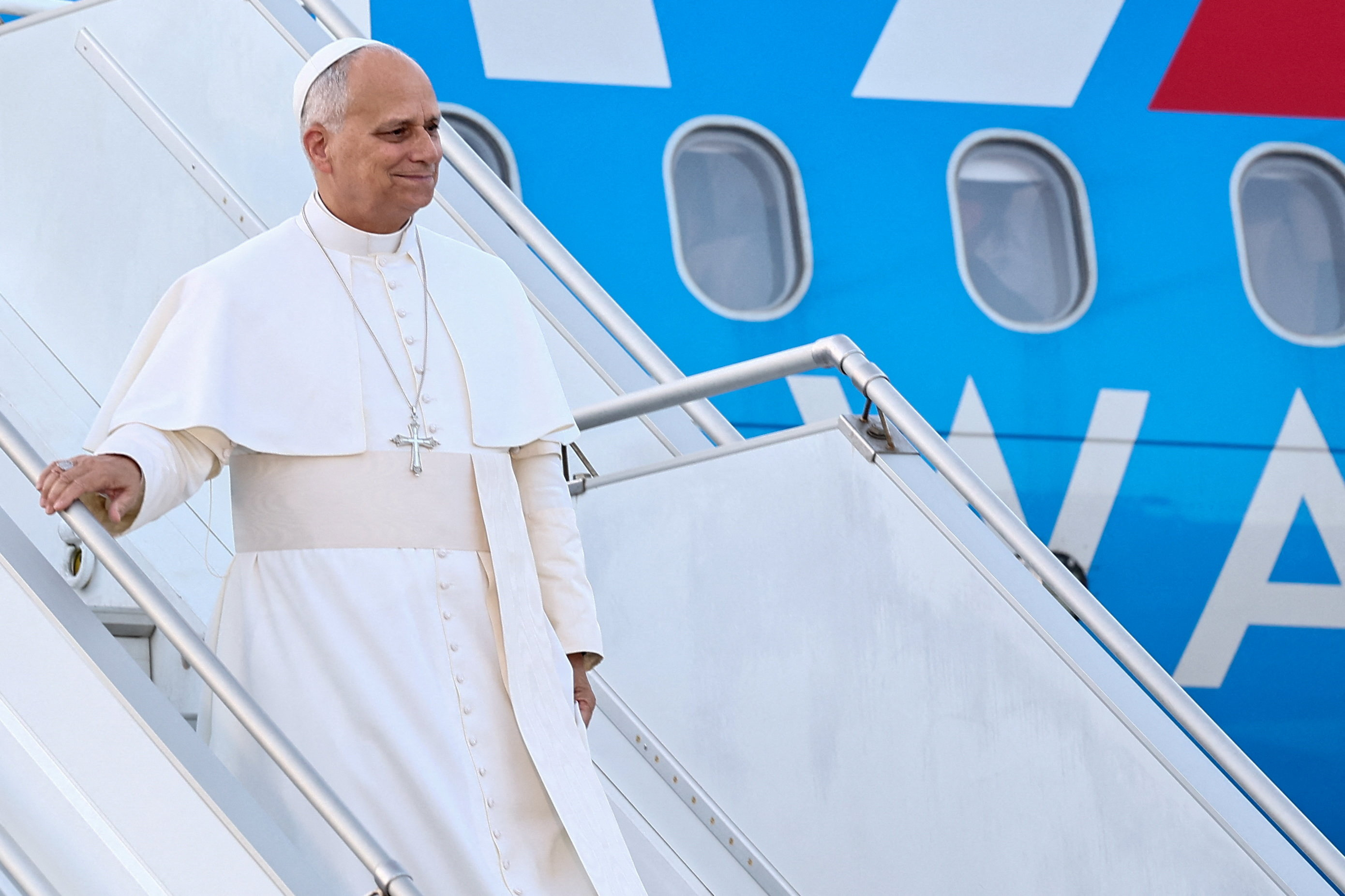 Pope Leo XIV disembarks the papal plane upon arrival at Rafic Hariri International Airport, during his first apostolic journey, in Beirut, Lebanon, November 30, 2025. REUTERS/Yara Nardi