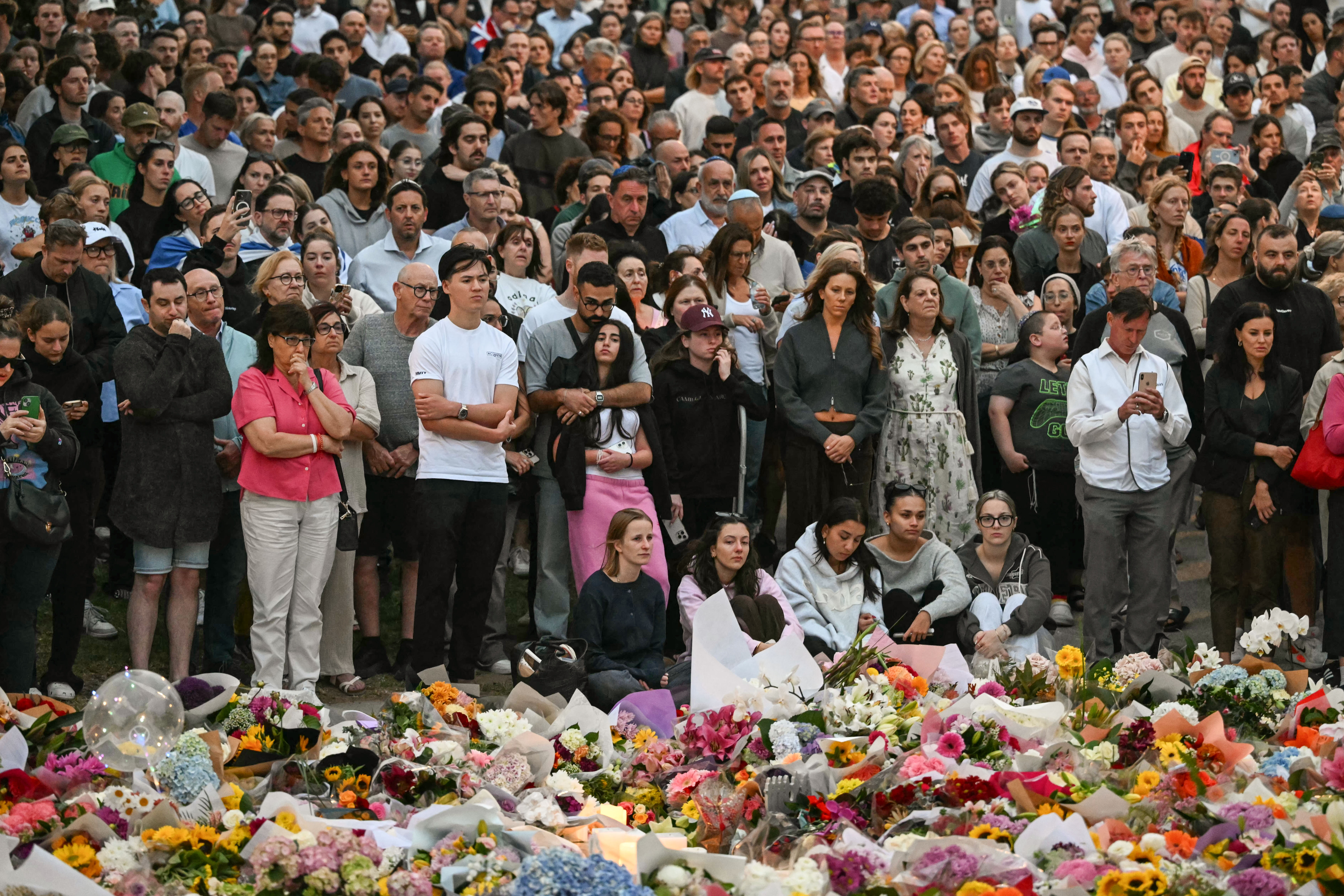 Mourners gather at a tribute at the Bondi Pavillion