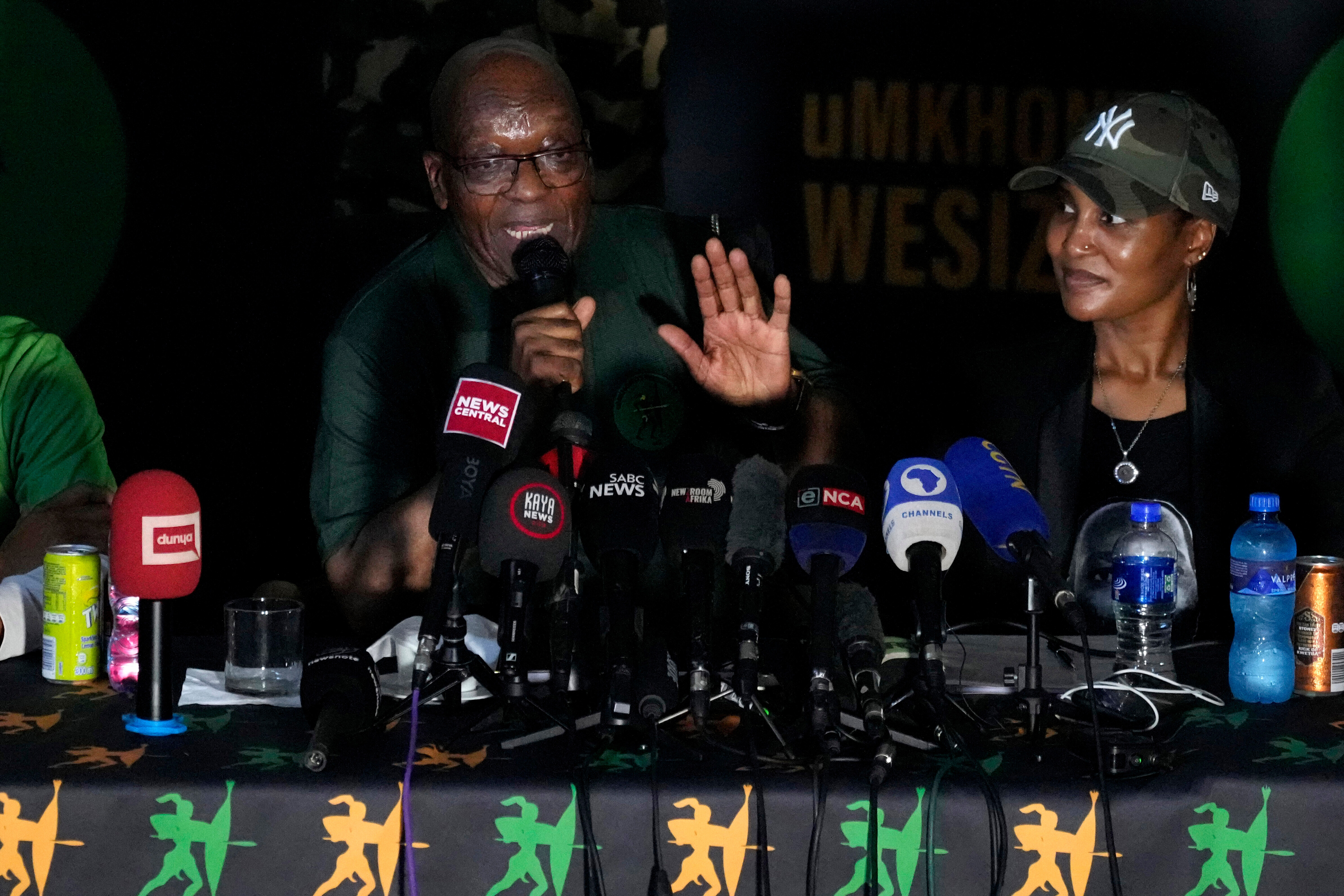 FILE – Former South African President Jacob Zuma speaks as his daughter Duduzile Zuma-Sambudla, right, listens, during a news conference in Soweto, South Africa, December 16, 2023