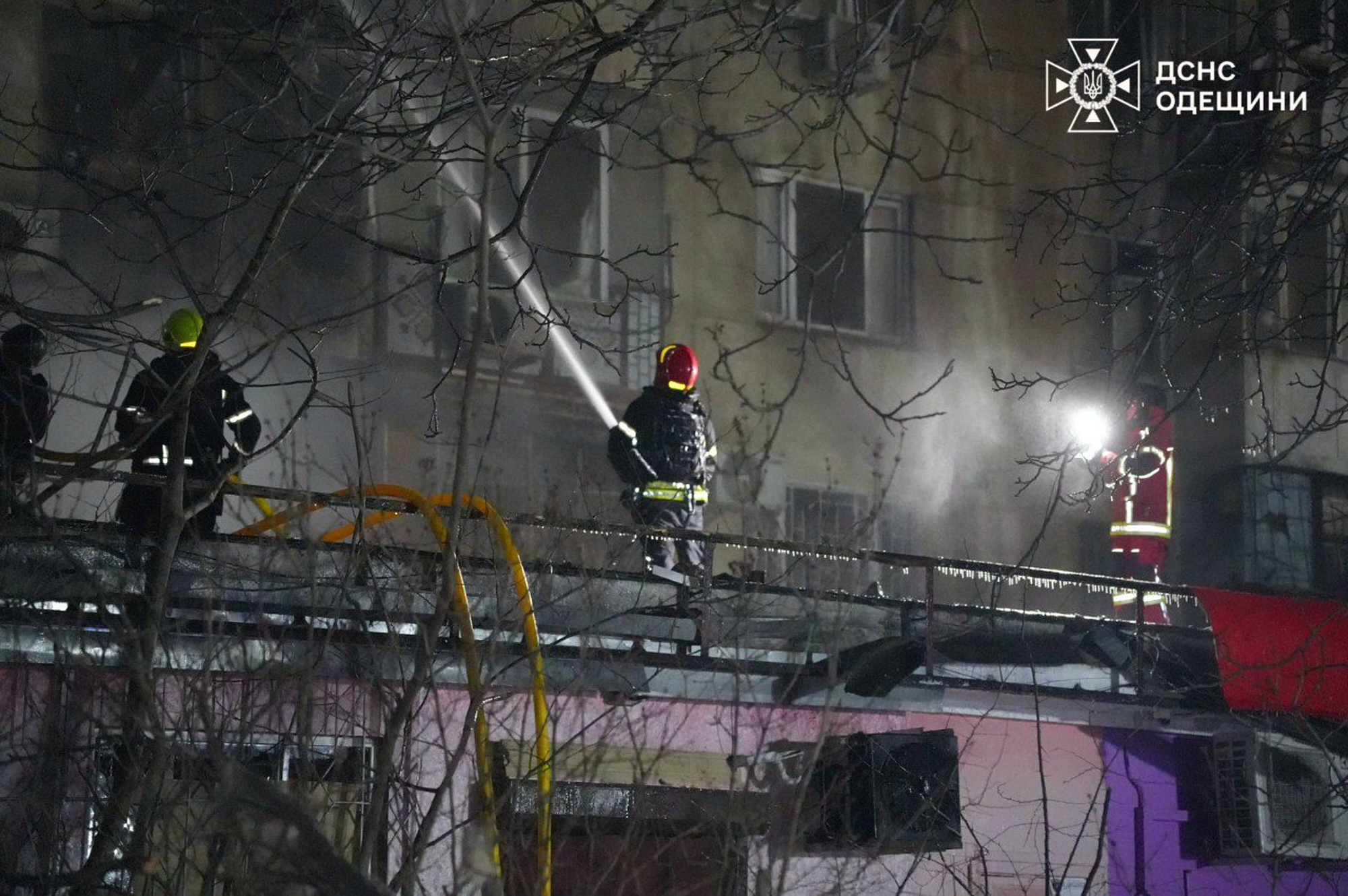 In this photo provided by the Ukrainian Emergency Service, emergency services personnel work to extinguish a fire following a Russian attack in Odesa, Ukraine, on Wednesday, December 31, 2025 [Ukrainian Emergency Service via AP Photo]