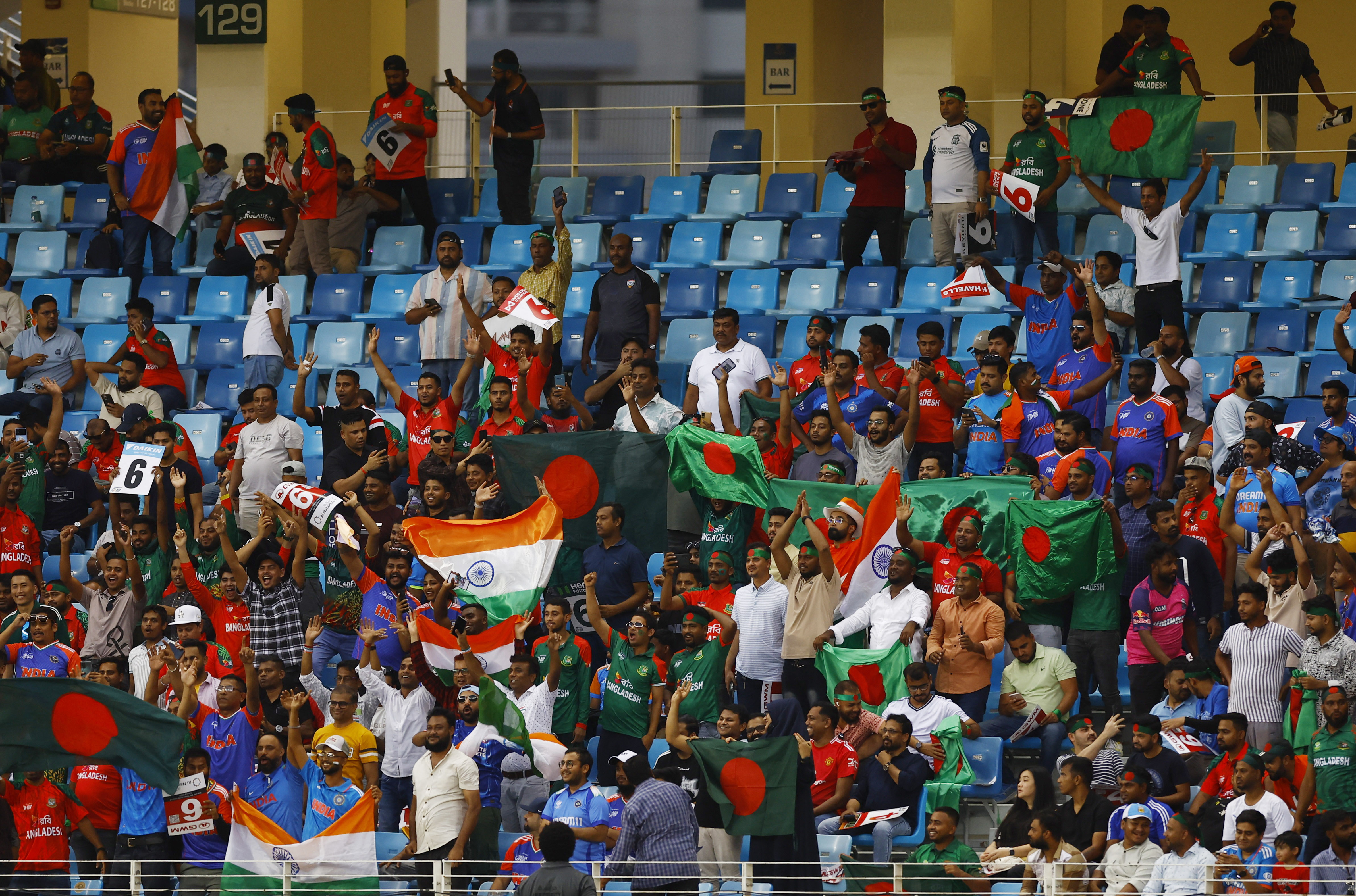 Cricket - Asia Cup - India v Bangladesh - Dubai International Cricket Stadium, Dubai, United Arab Emirates - September 24, 2025 Bangladesh and India fans inside the stadium before the match REUTERS/Raghed Waked