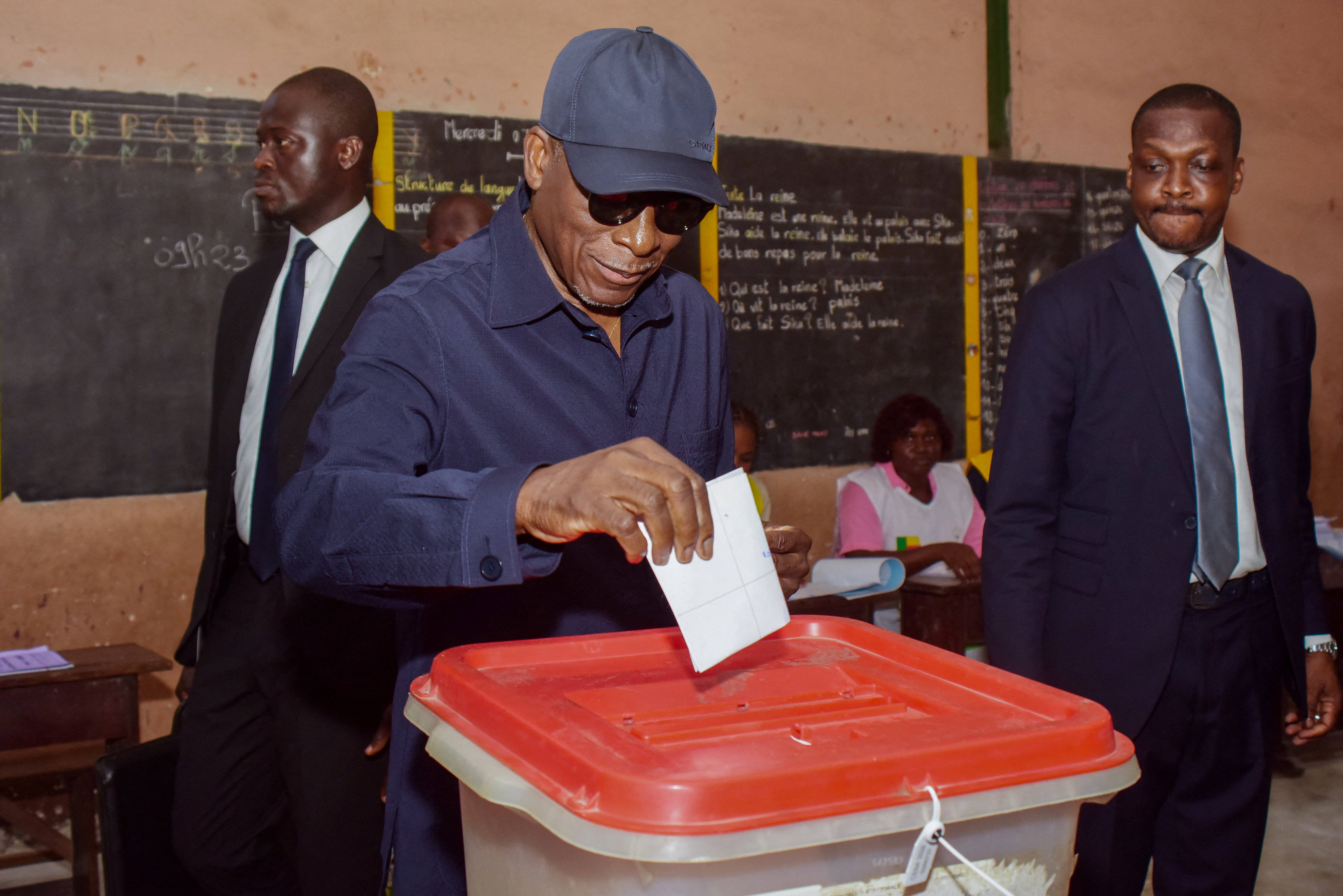 Benin's President Patrice Talon votes at a polling station during the country's parliamentary election, in Cotonou, Benin, January 11, 2026