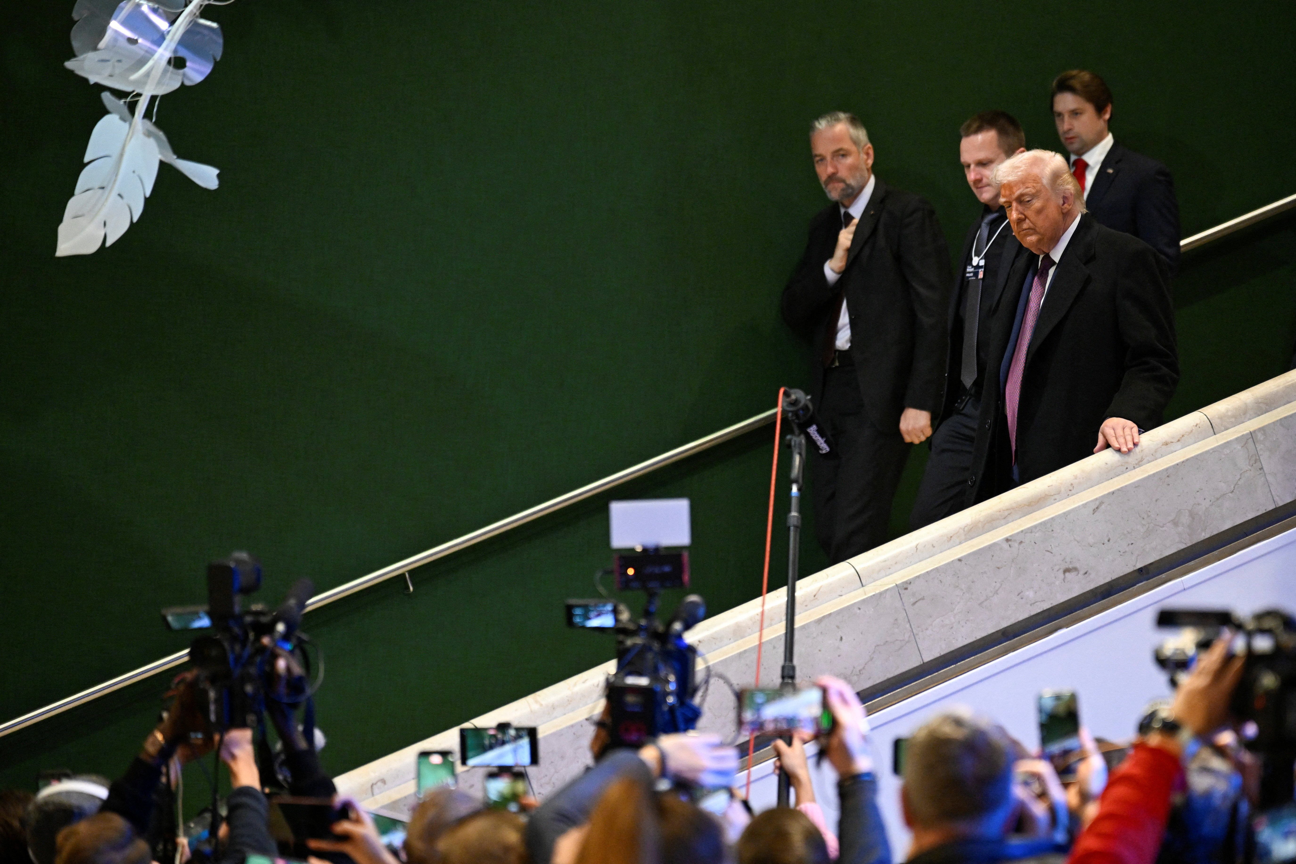 U.S. President Donald Trump walks during the 56th annual World Economic Forum (WEF) meeting in Davos, Switzerland, January 22, 2026. [Romina Amato/Reuters]