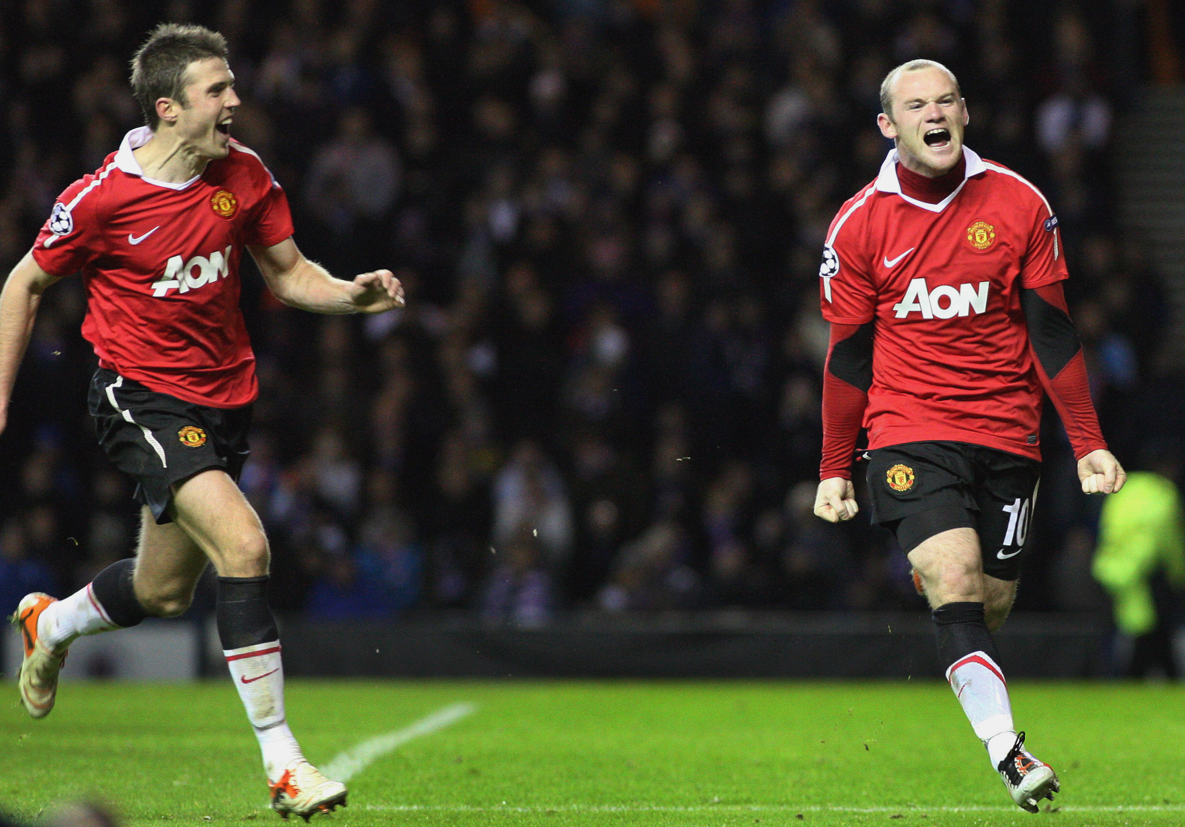 Michael Carrick, left, pictured here with Manchester United’s Wayne Rooney in 2010, played with the English mega club from 2006 until 2018