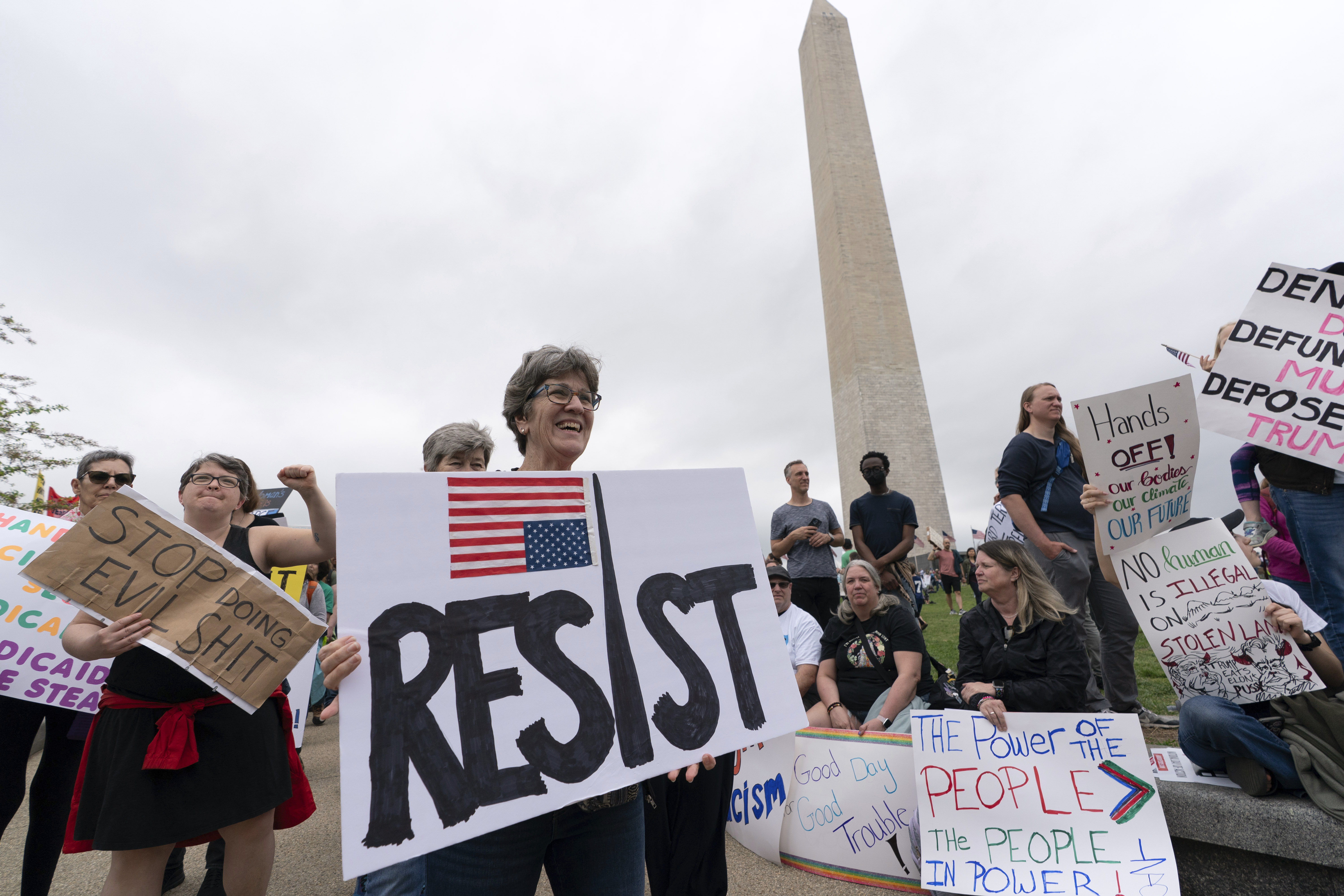 Protesters demonstrate in front of the Washington Monument