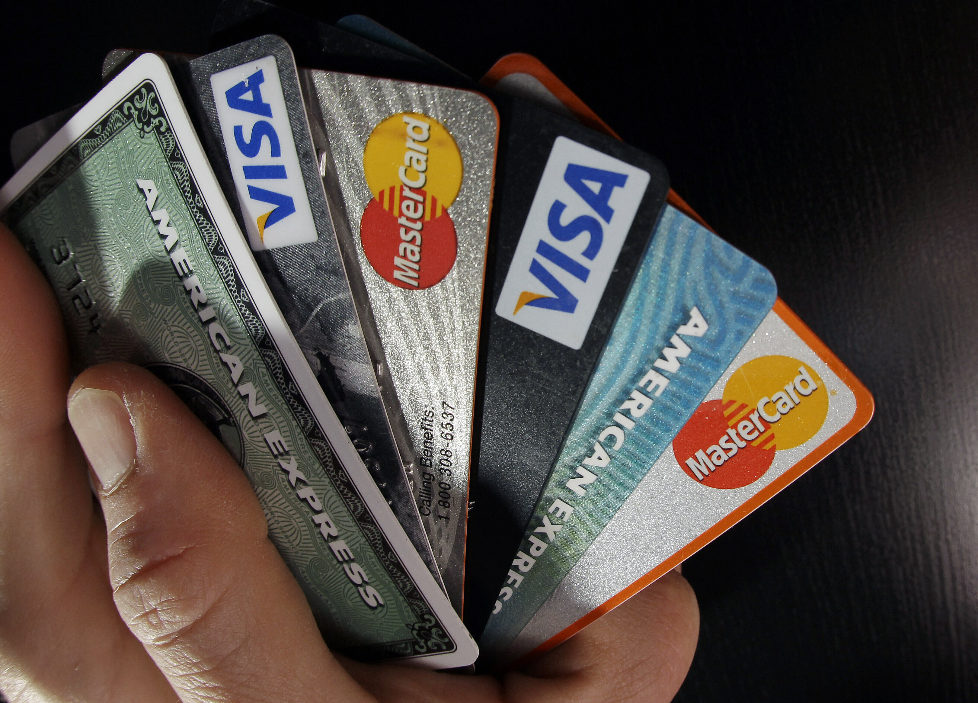 Consumer credit cards are shown in North Andover, Massachusetts, the US, on March 5, 2012