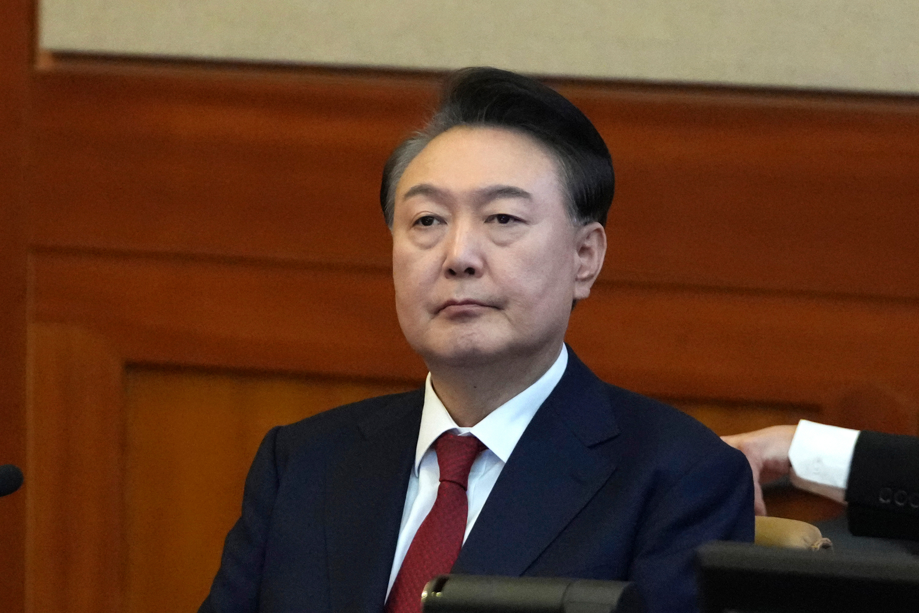 FILE - South Korea's impeached President Yoon Suk Yeol attends a hearing of his impeachment trial at the Constitutional Court in Seoul, South Korea, on Feb. 11, 2025. (AP Photo/Lee Jin-man, Pool, File)