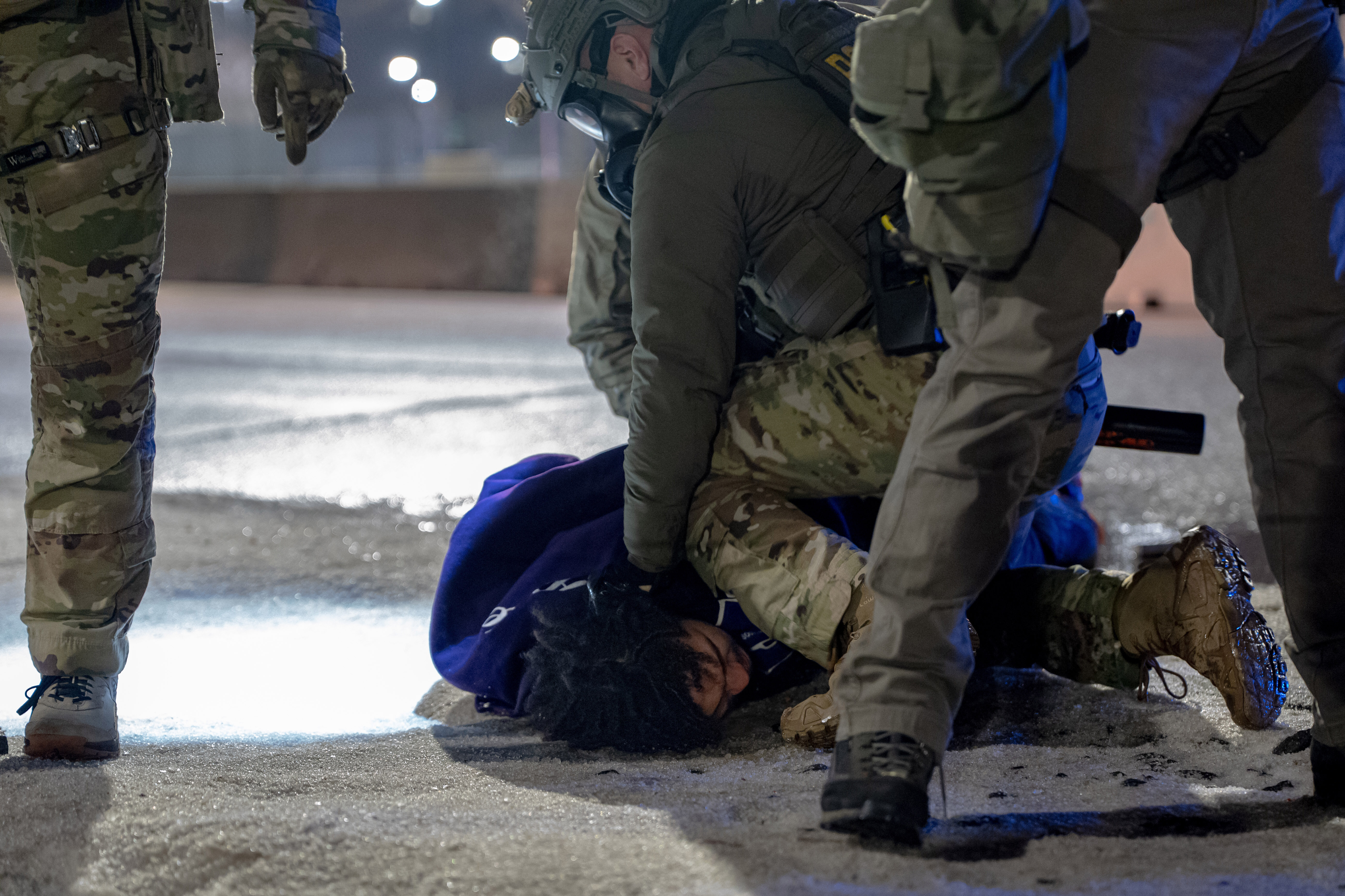 Tensions flare in Minnesota as protesters and federal agents square off