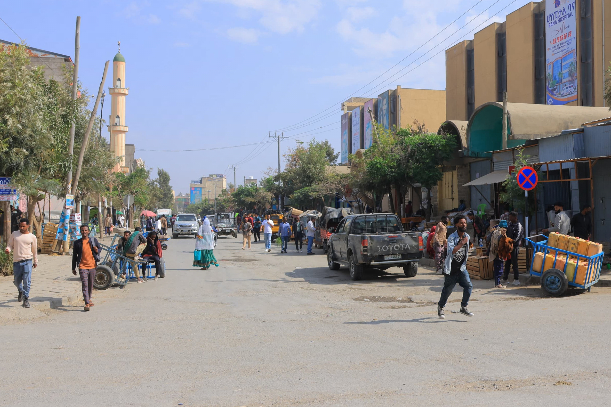 Locals walk along a street as concerns grow over possible renewed fighting between federal and regional forces in Mekele, in Ethiopia's northern Tigray region, Saturday, Jan. 31, 2026