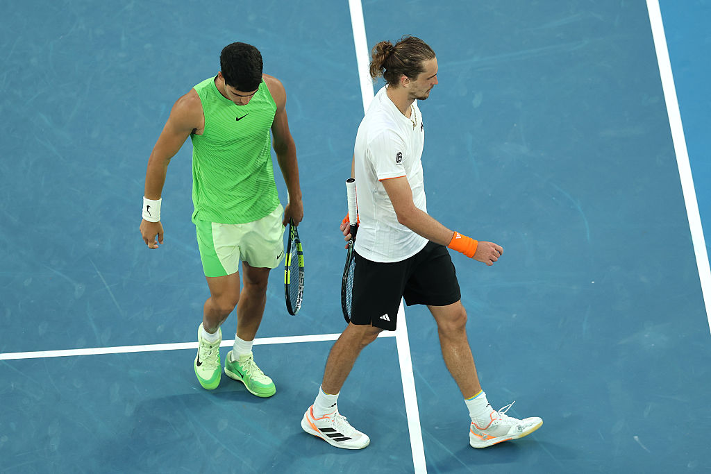 Carlos Alcaraz, left, of Spain, and Alexander Zverev, right, of Germany, react after the former’s victory in the Men’s Singles semifinal
