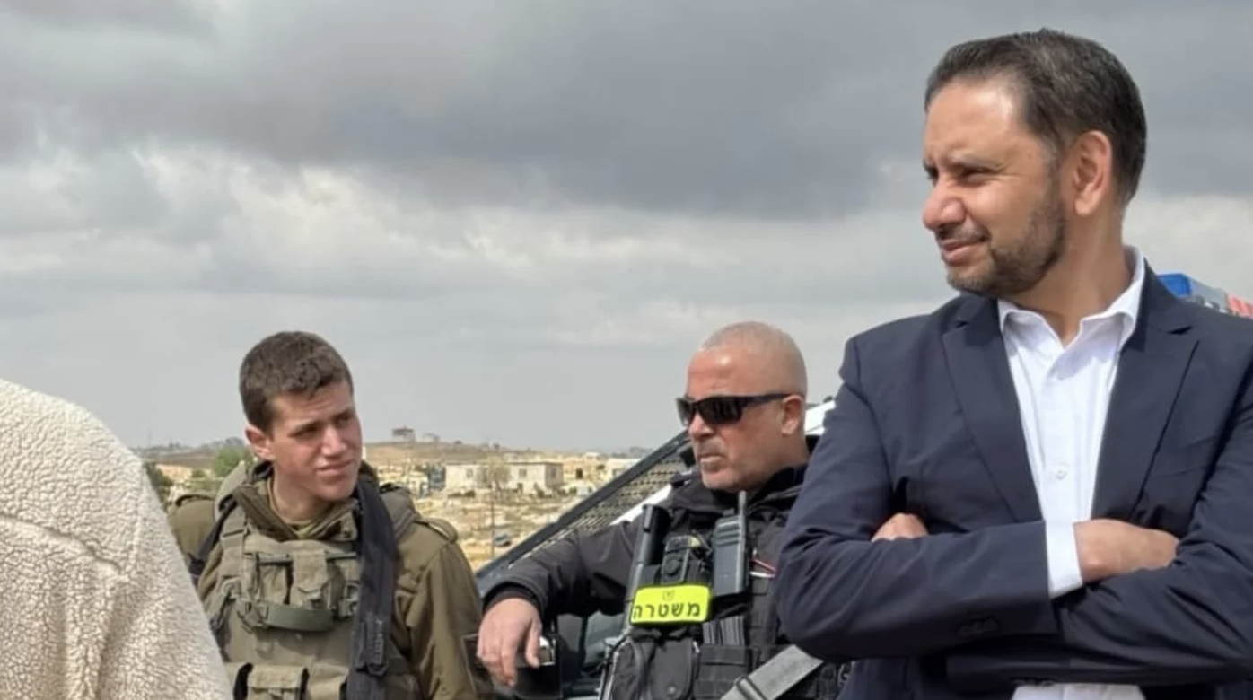 The author in Masafer Yatta, occupied west Bank, while being confronted by Israeli soldiers and armed settlers [Courtesy of Shockat Adam]