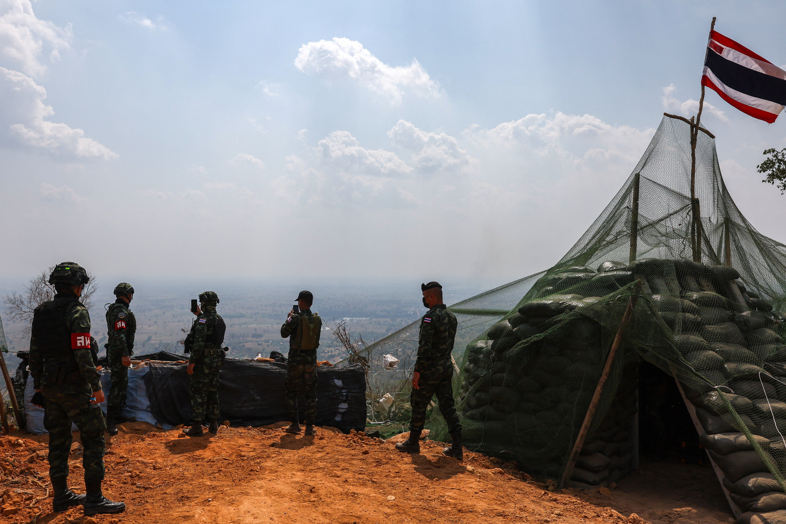 Soldiers stand guard near a bunker at Hill 350, a site of clashes between Thailand and Cambodia in December 2025, in Surin province, Thailand. [Athit Perawongmetha/Reuters]