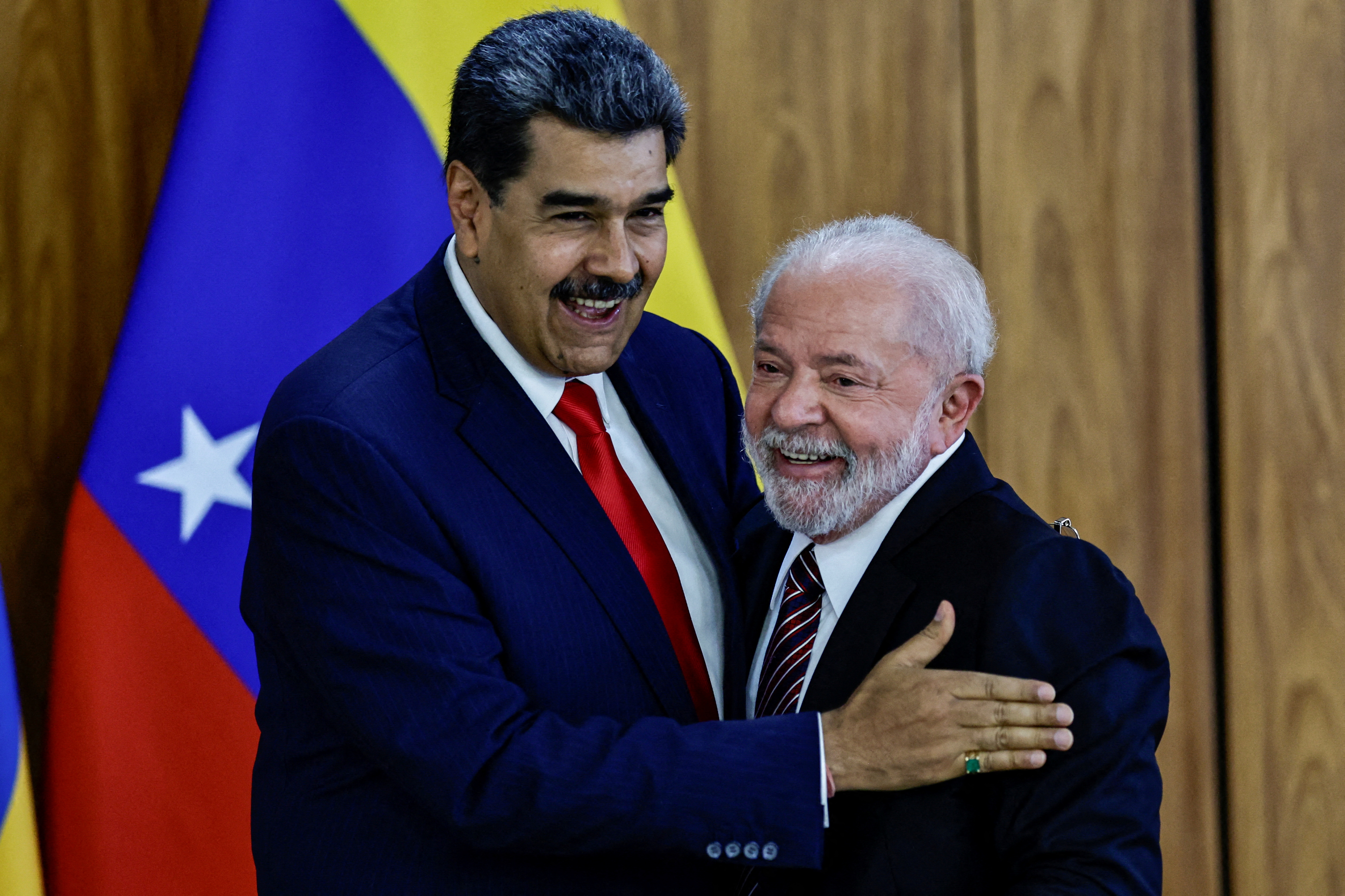 Venezuela's President Nicolas Maduro and Brazil's President Luiz Inacio Lula da Silva gesture before a summit with presidents of South America to discuss the re-launching of the regional cooperation bloc UNASUR, in Brasilia, Brazil, May 29, 2023. REUTERS/Ueslei Marcelino REFILE - CORRECTING INFORMATION